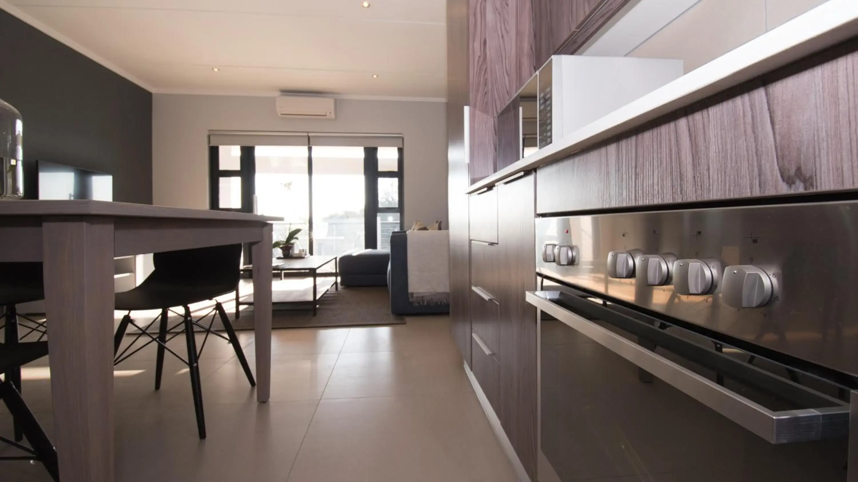 Kitchen or kitchenette in Odyssey Luxury Apartments