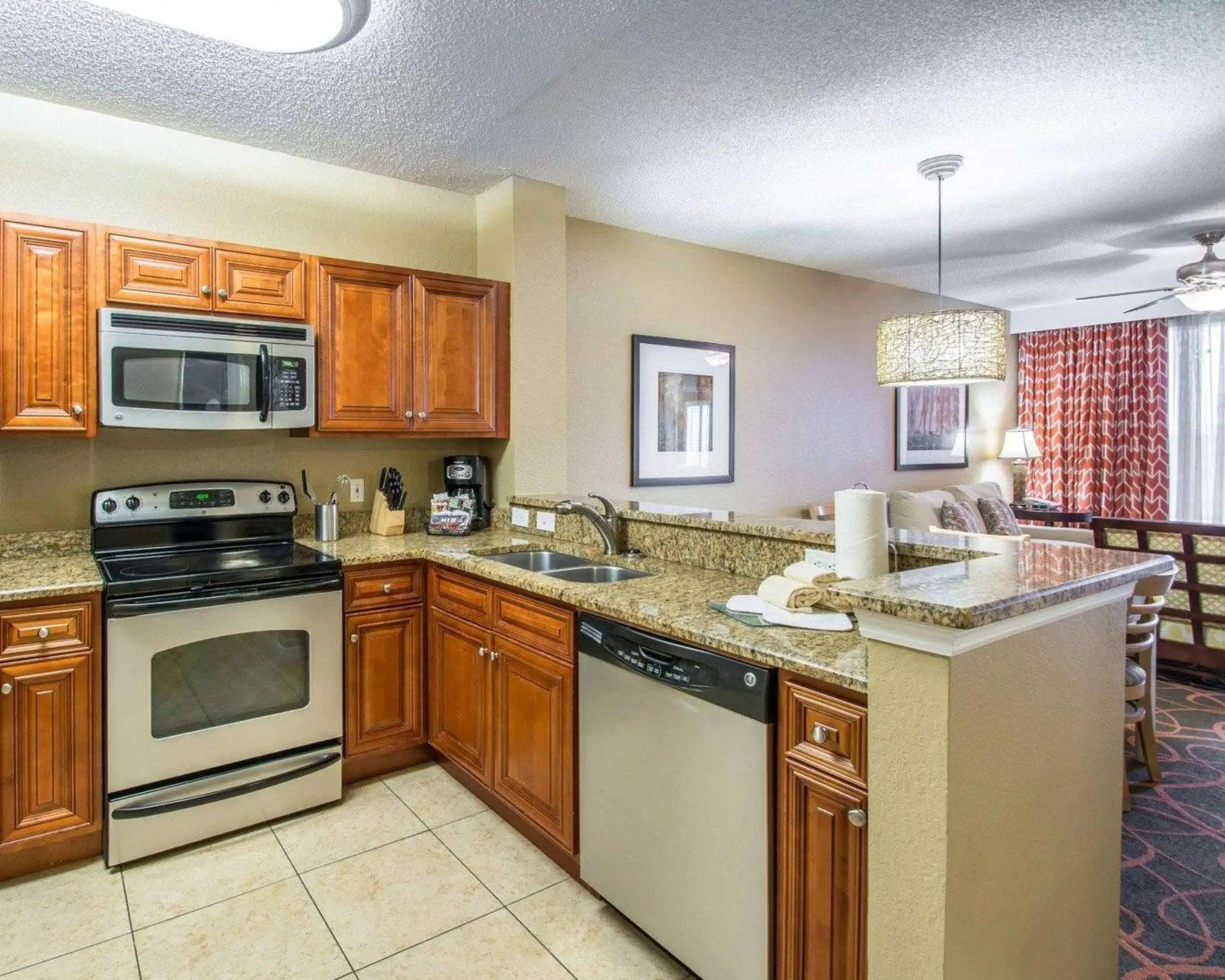 Photo of the whole room, Kitchen/Kitchenette in Bluegreen Vacations Orlando's Sunshine Resort
