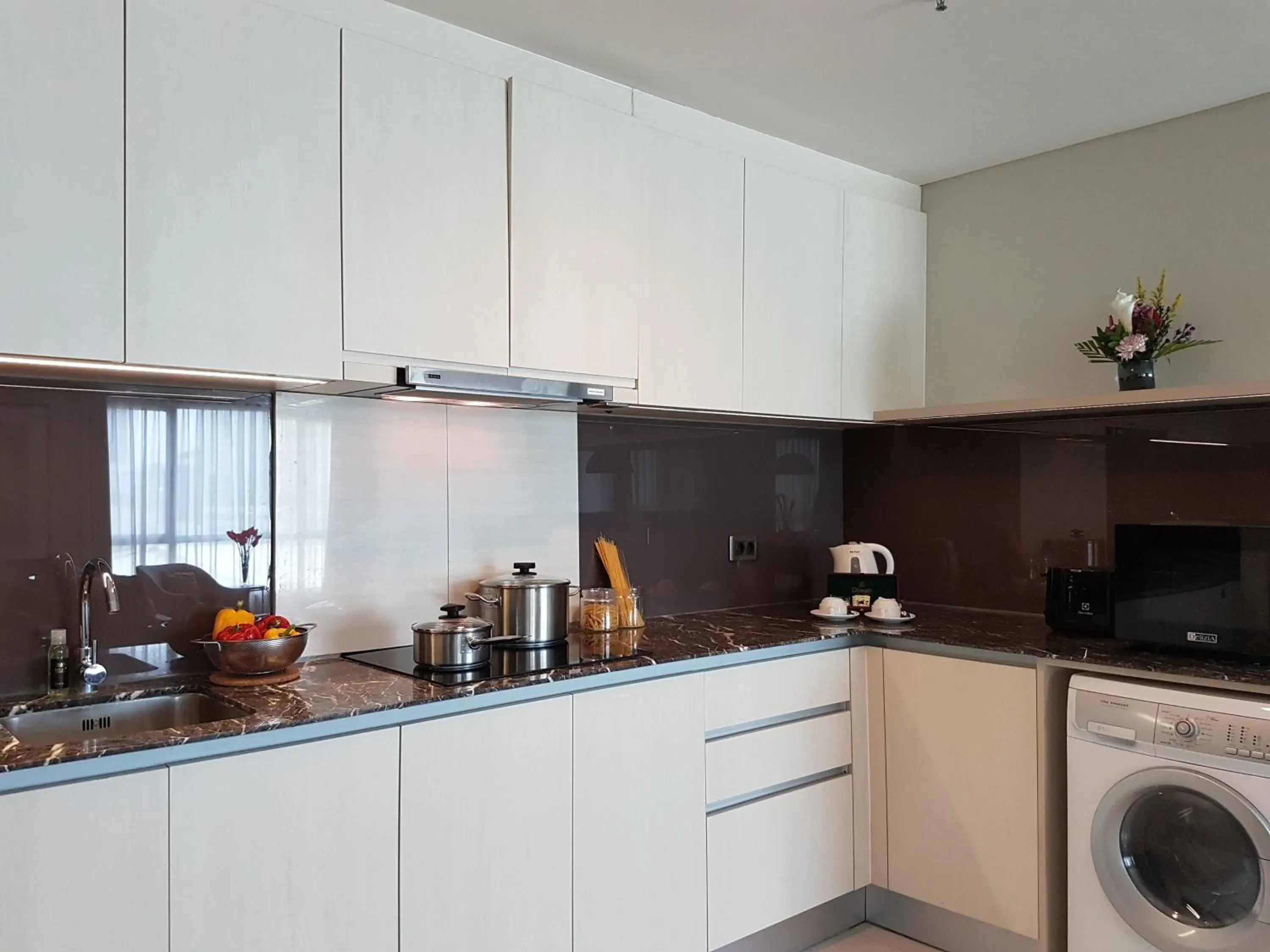 Kitchen or kitchenette, Kitchen/Kitchenette in Ascott Waterplace Surabaya