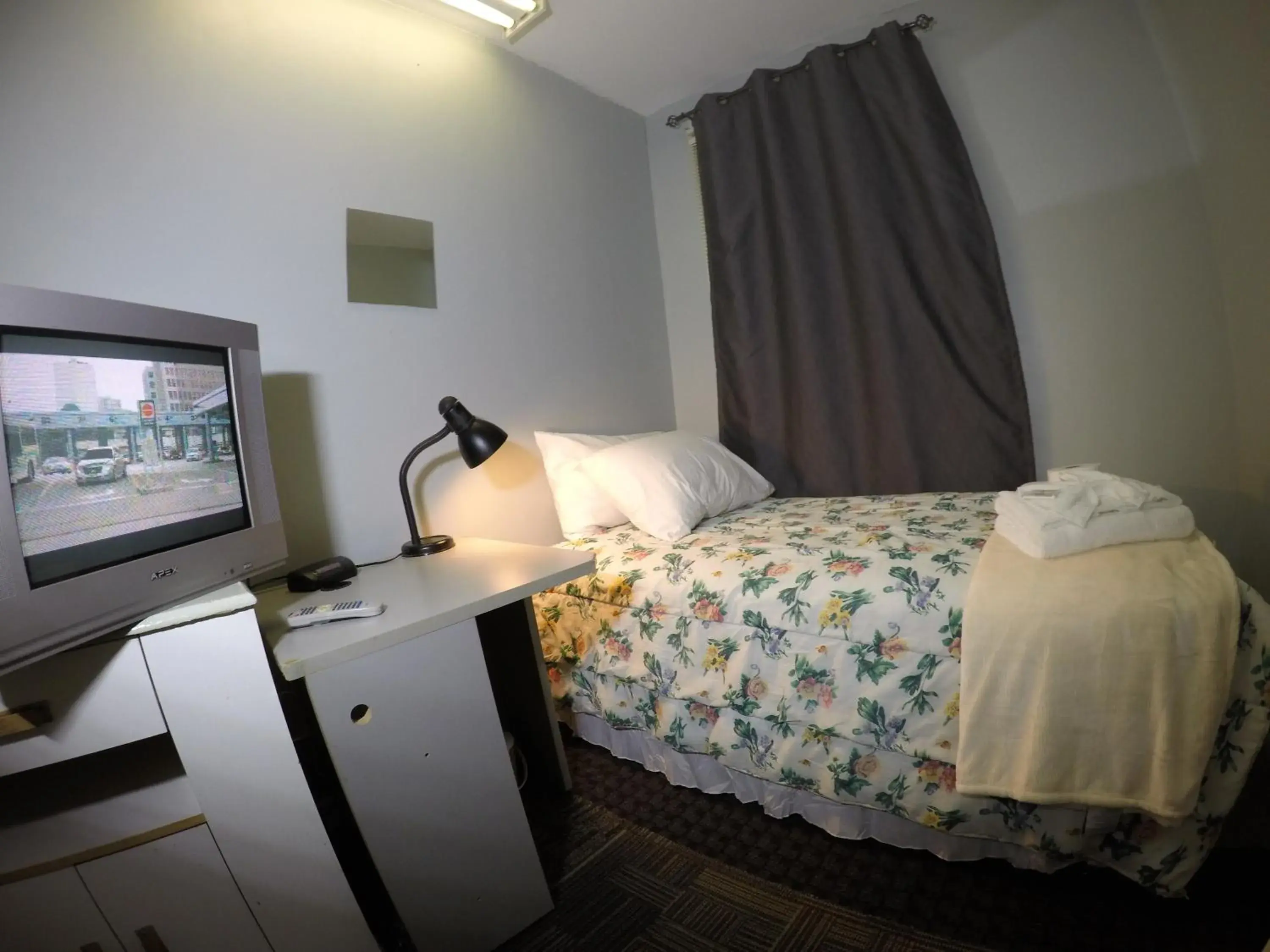 Photo of the whole room, Bed in Saint Lawrence Residences and Suites