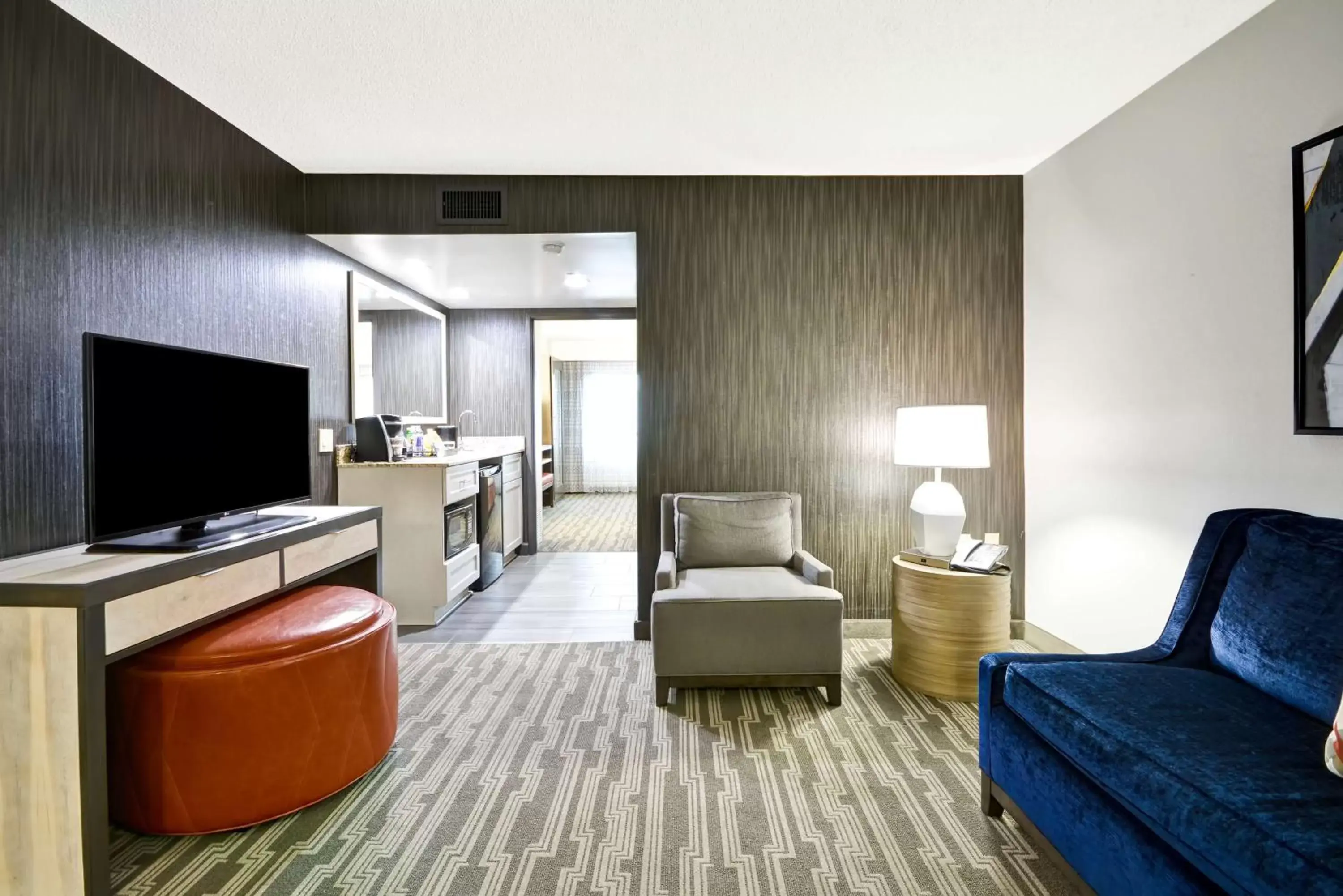 Bed, TV/Entertainment Center in Embassy Suites Charlotte