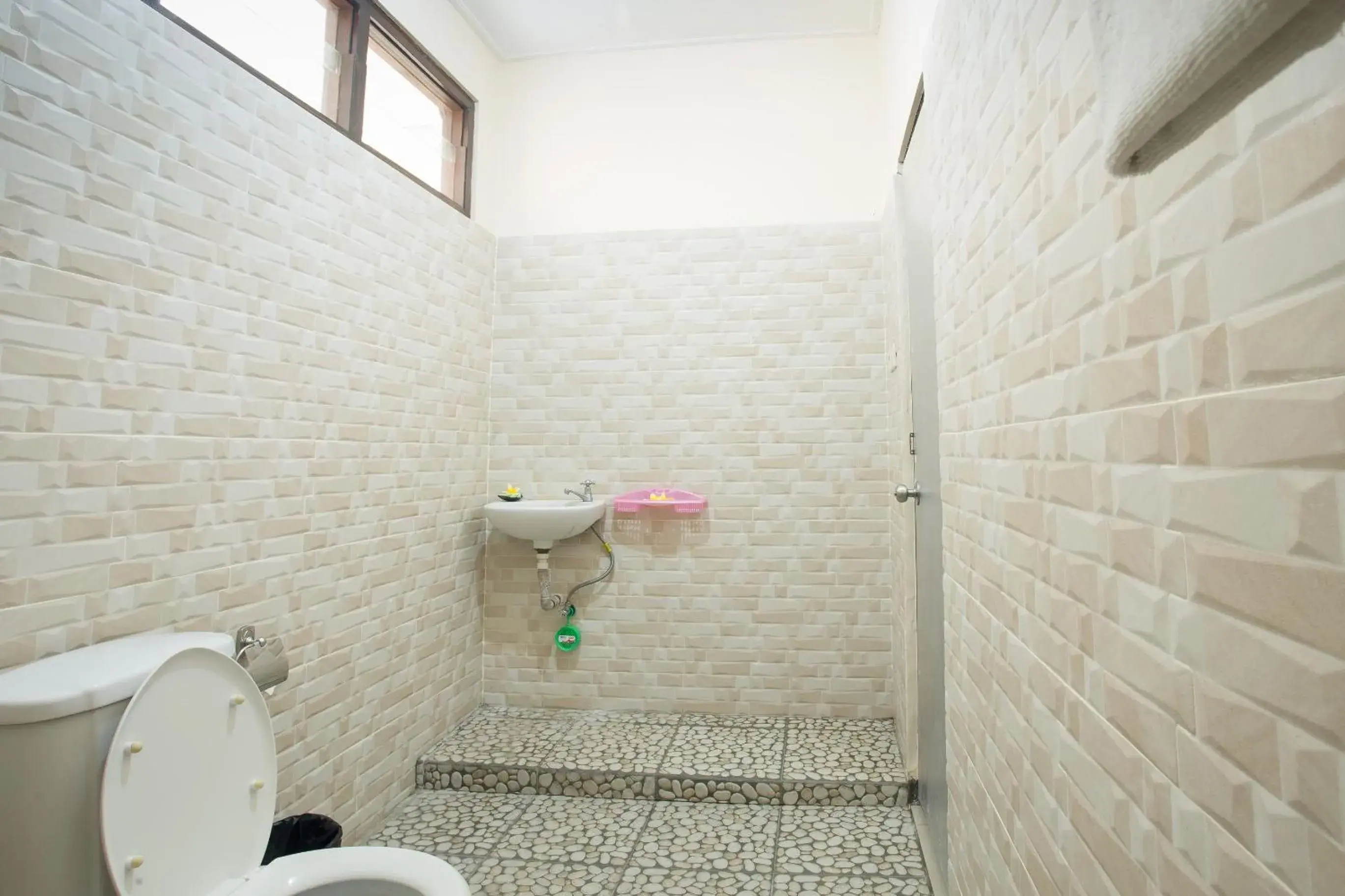 Bathroom in Blanjong Homestay by ecommerceloka