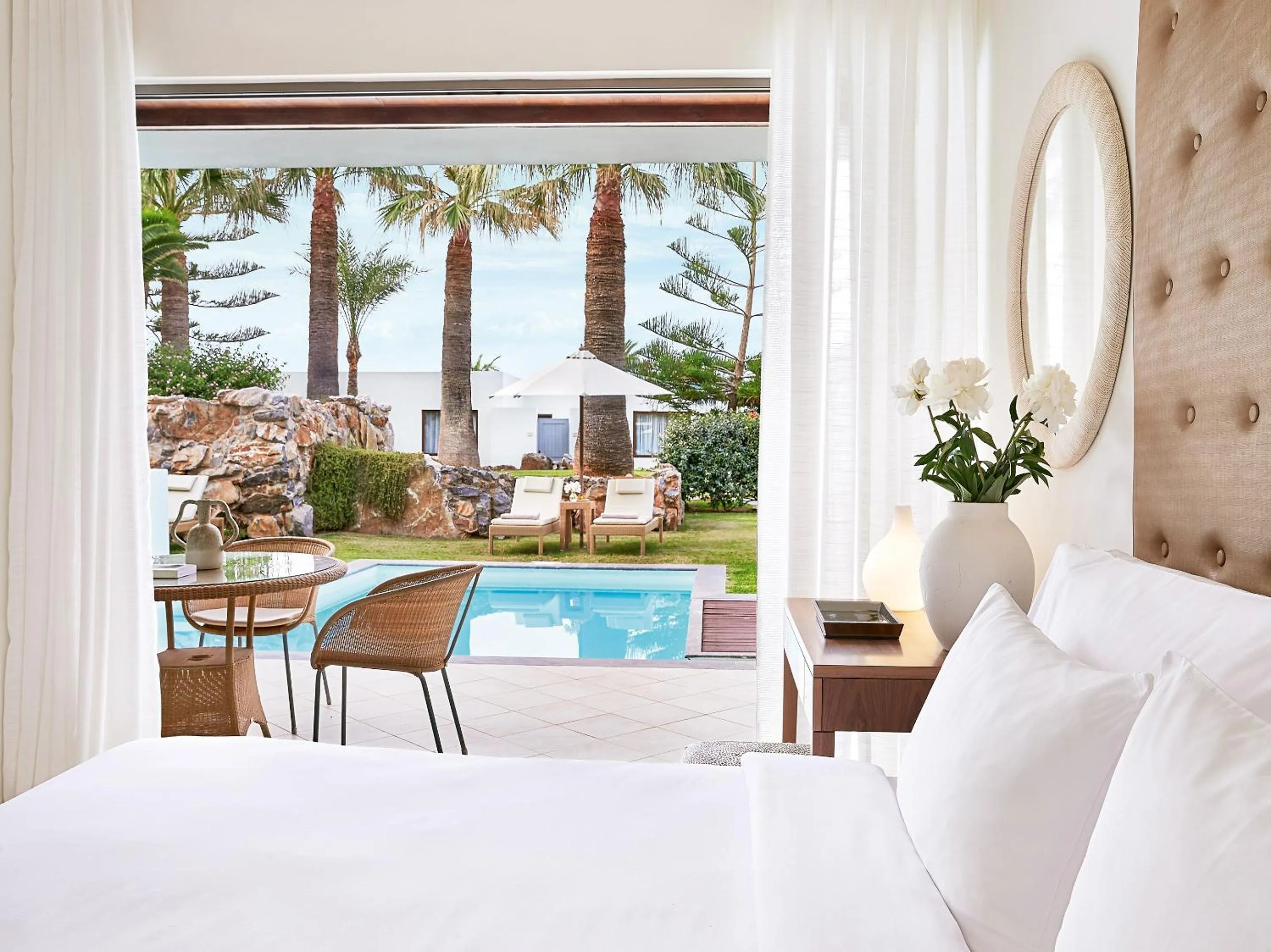 Swimming pool, Bed in Amirandes, A Grecotel Resort to Live