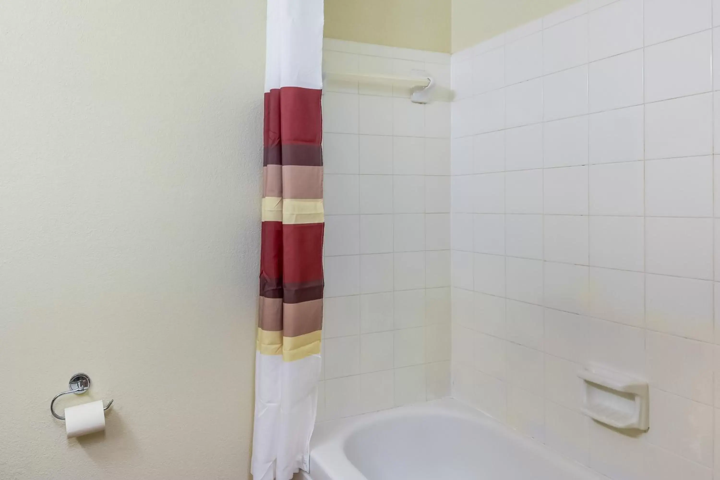 Bathroom in HomeTowne Studios by Red Roof Dallas - North Addison - Tollway