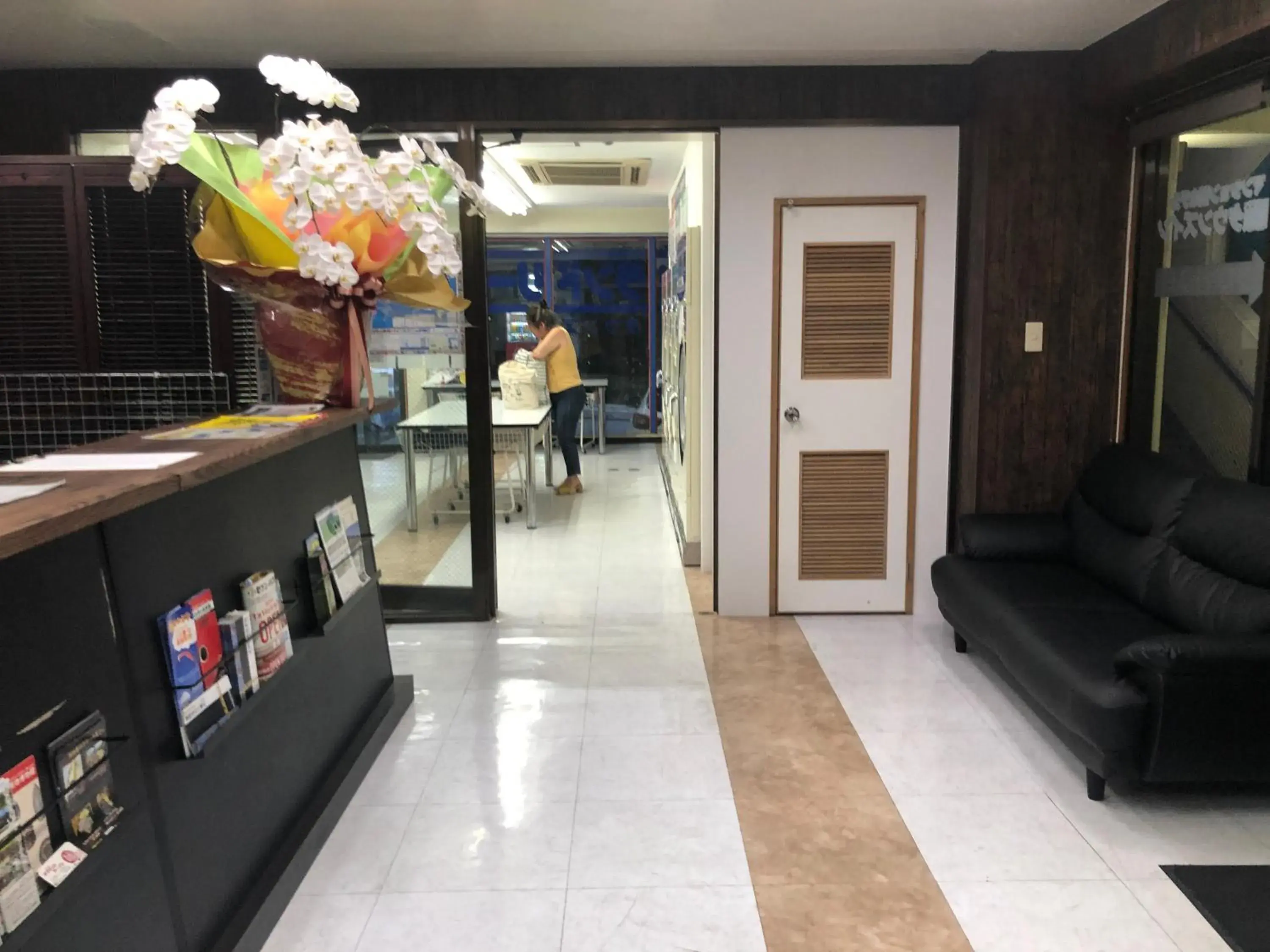 Lobby or reception in Kokusai Towns Inn