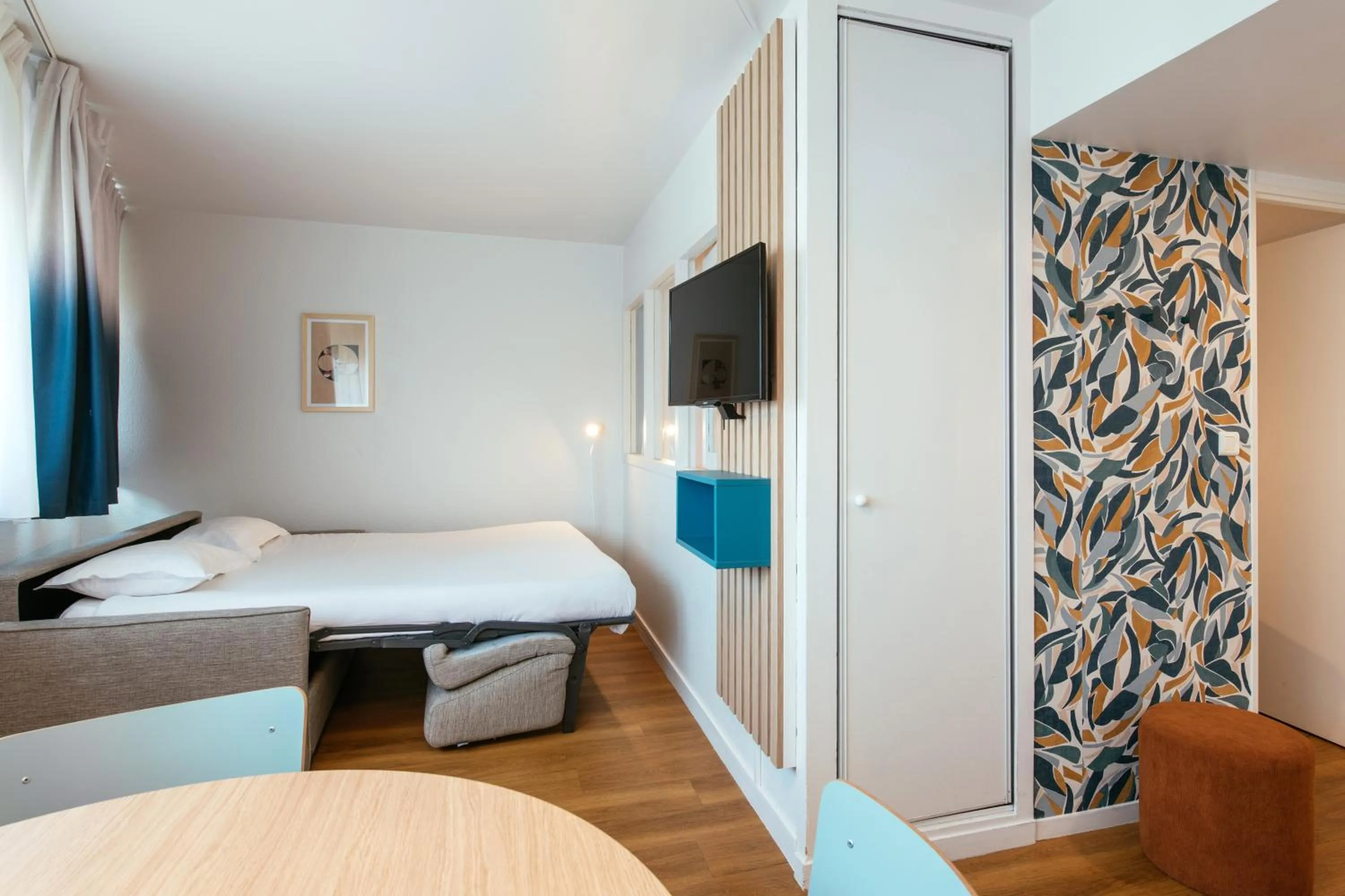 Bed in Aparthotel Adagio Access Paris La Villette
