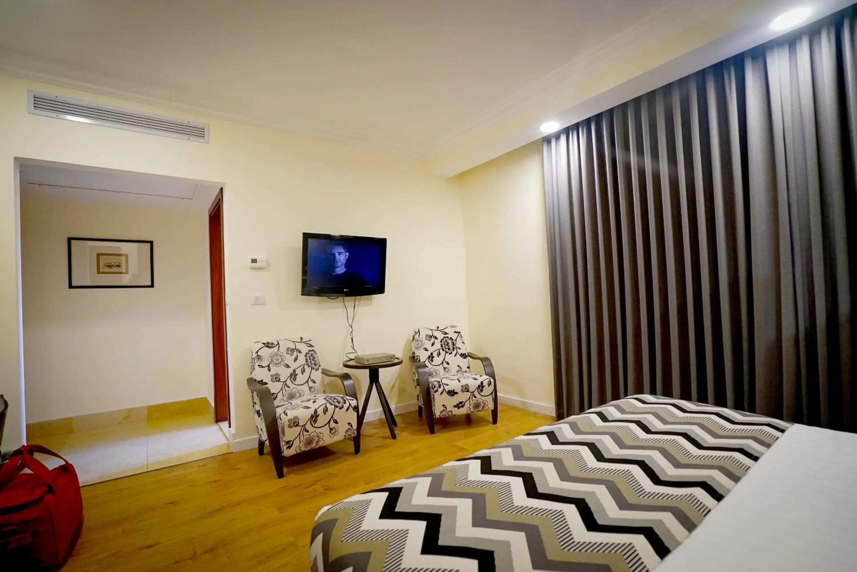 Superior Room with Balcony in Ambassador Hotel