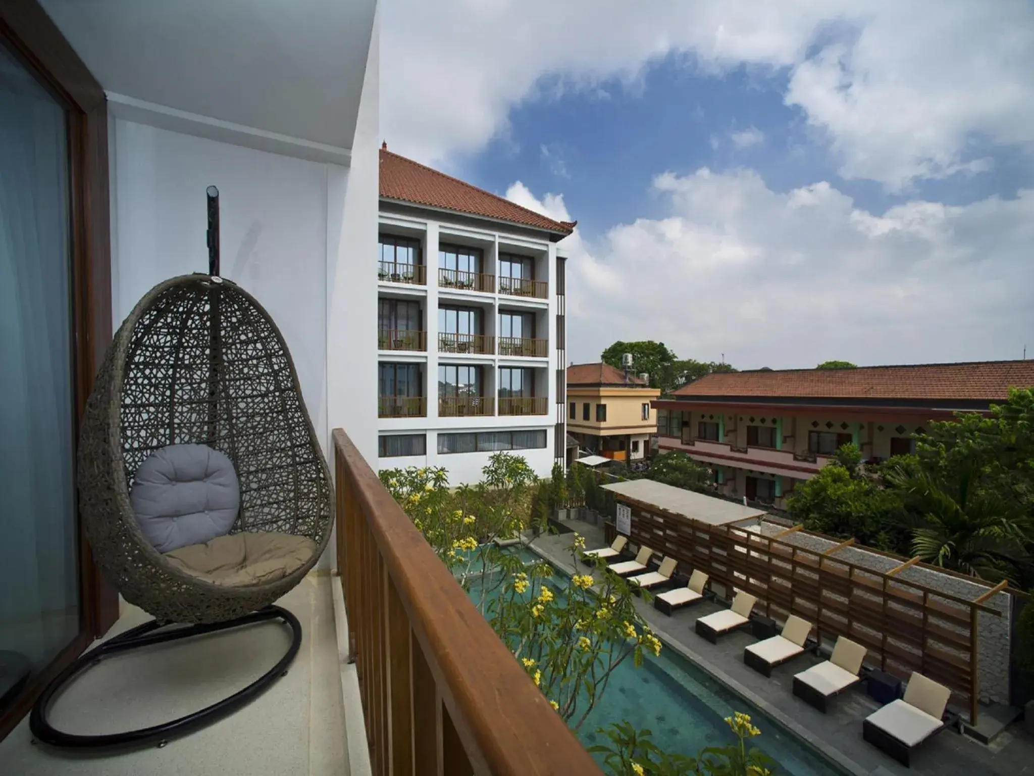 Balcony/Terrace, Pool View in Grand Zuri Kuta Bali Hotel