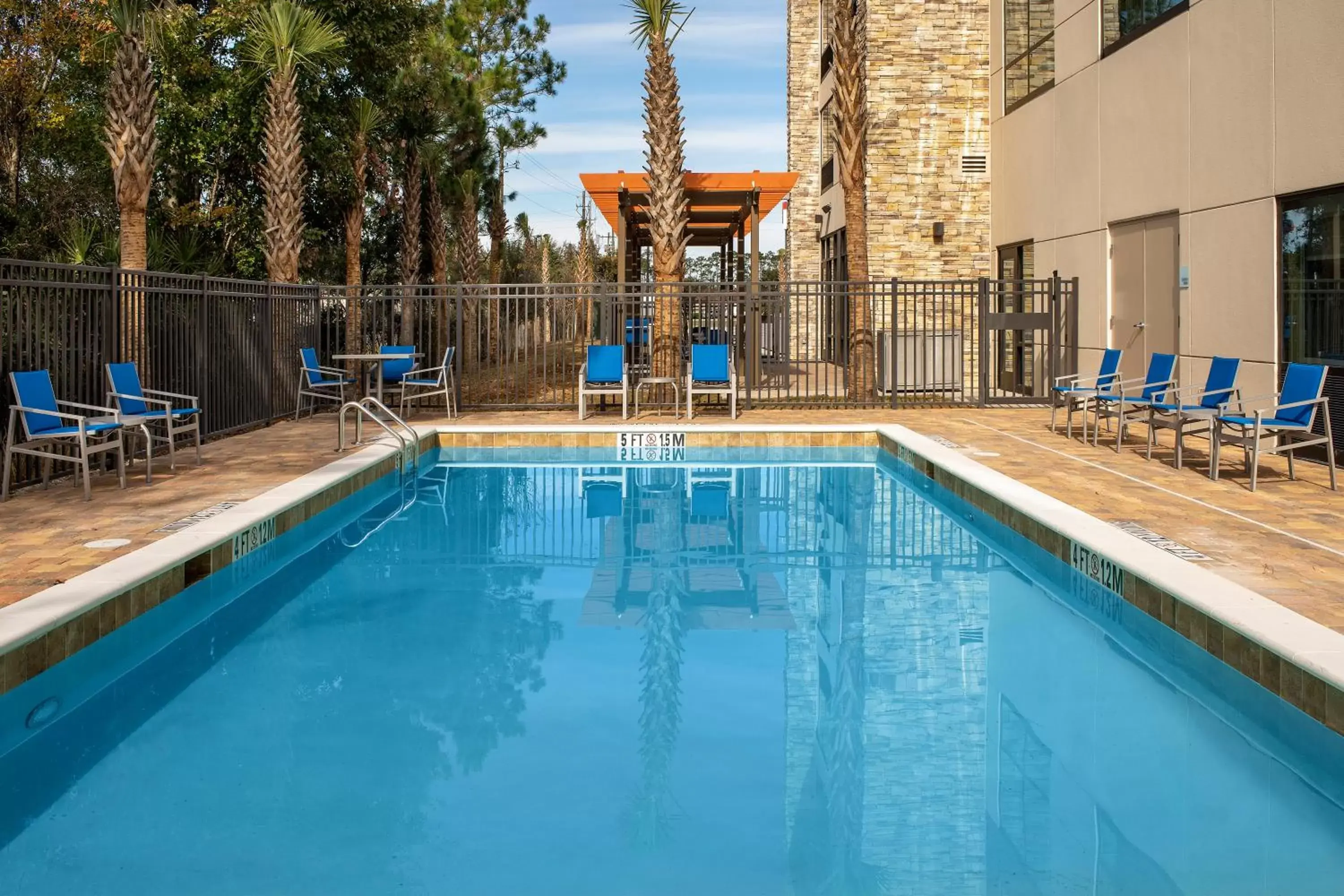 Swimming Pool in Holiday Inn Express & Suites Kingsland I-95-Naval Base Area, an IHG Hotel