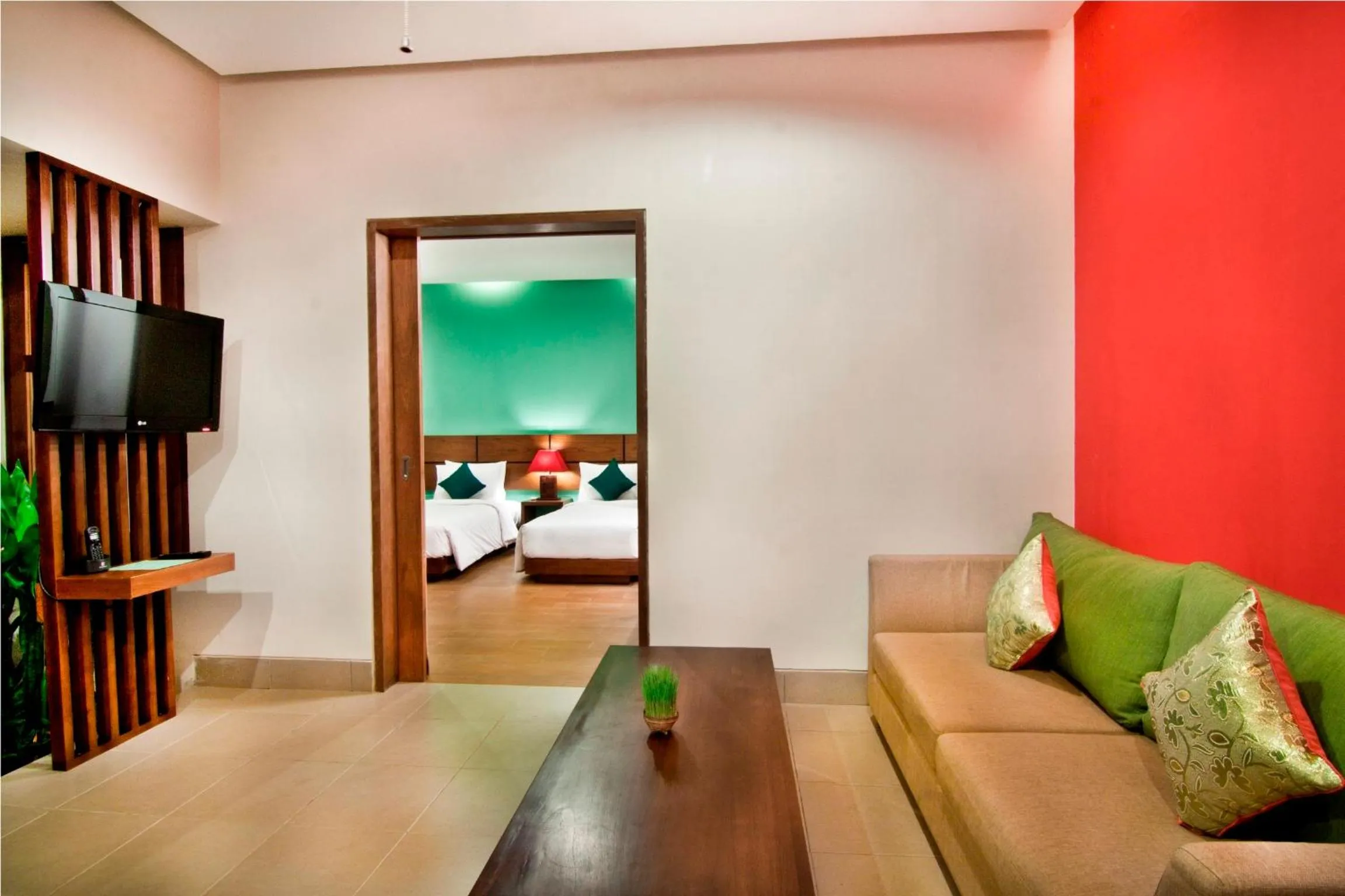 Seating area, Bed in The Green Zhurga Suite Seminyak