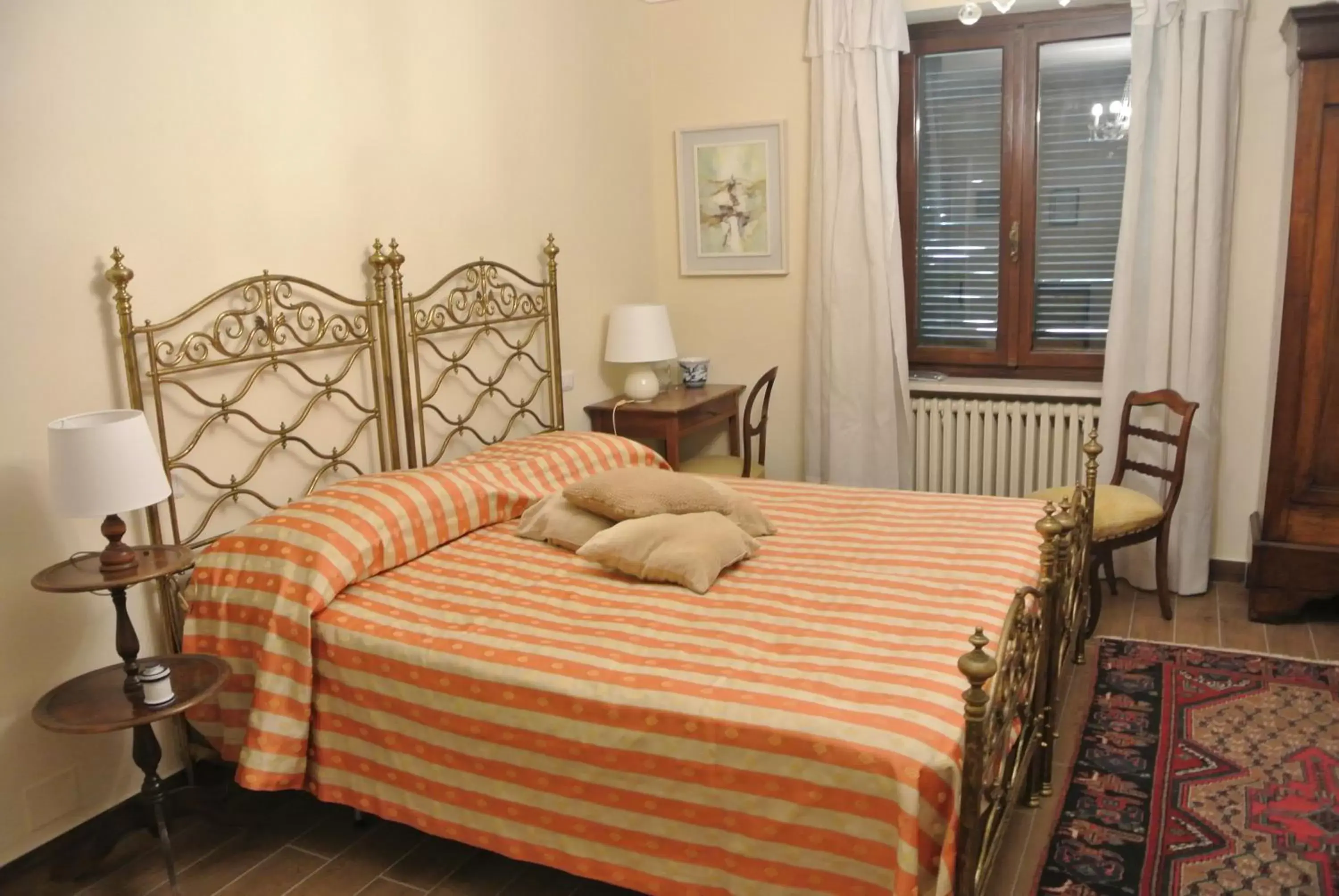 Bed in VILLA LE ROSE