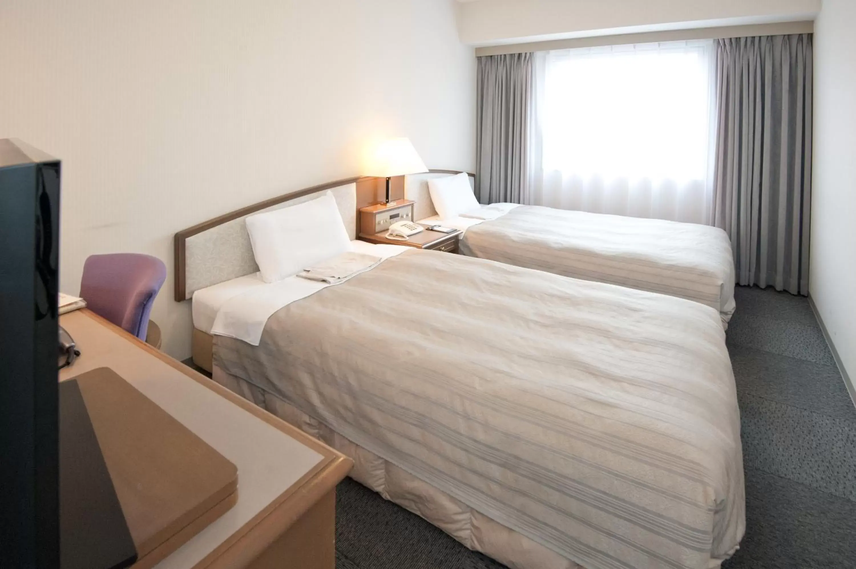 Photo of the whole room, Bed in Hotel Sunroute Niigata