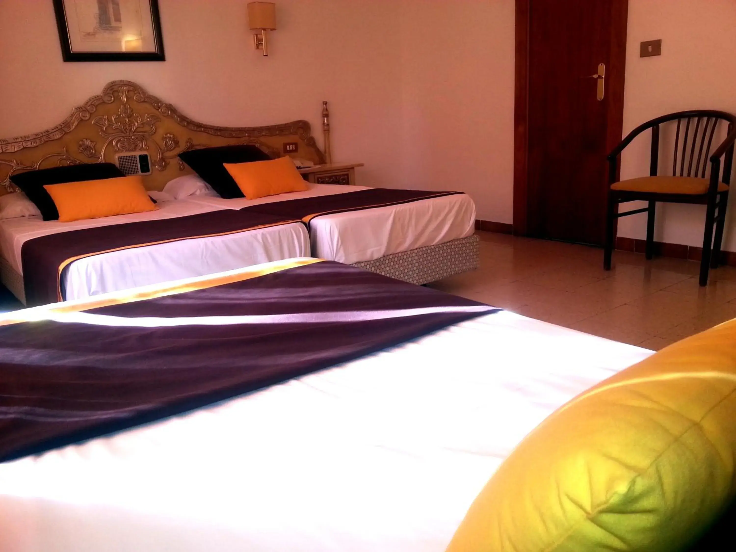 Bed in Hotel Hostal del Sol Bed in Hotel Hostal del Sol