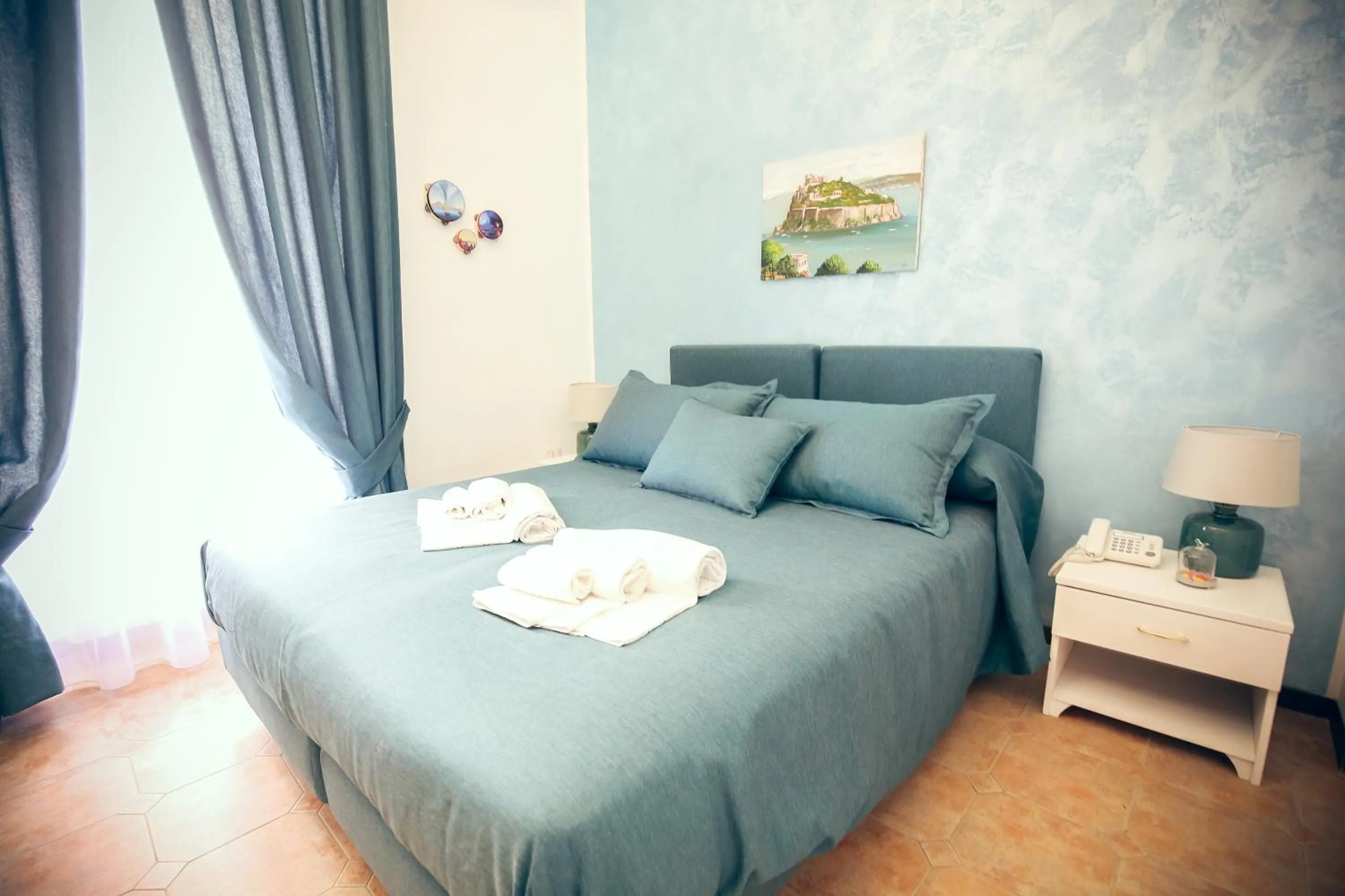 Bed in NapoliMia Boutique Hotel