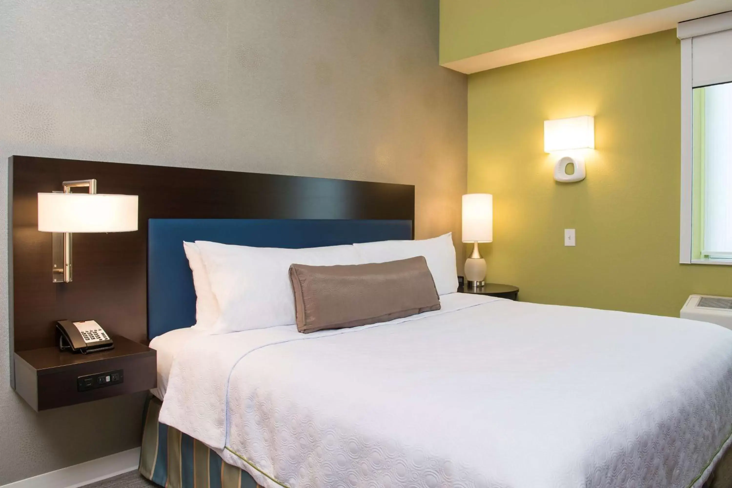 Bed in Home2 Suites by Hilton Indianapolis Downtown