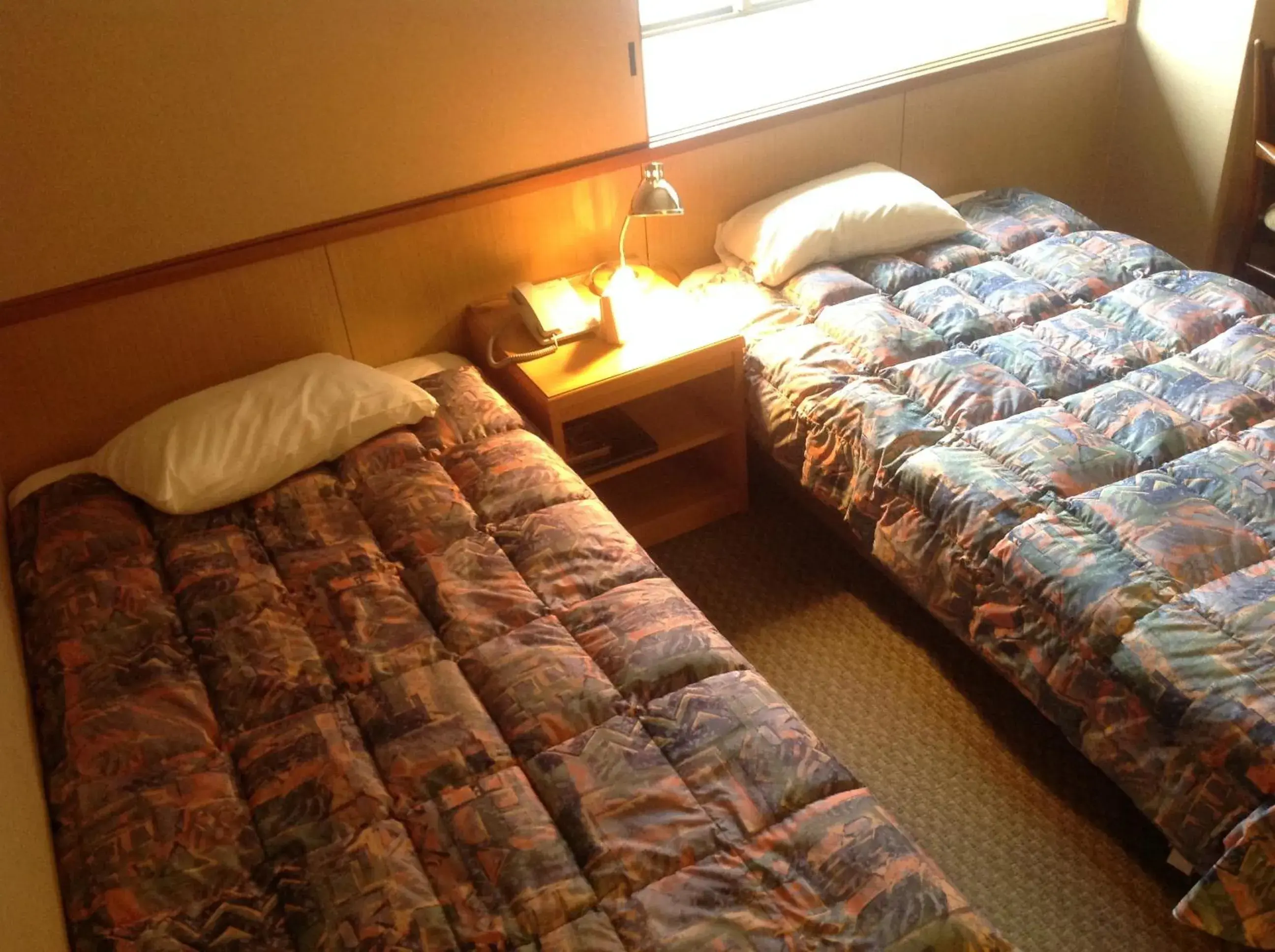 Bed in Miyajima Hotel Makoto