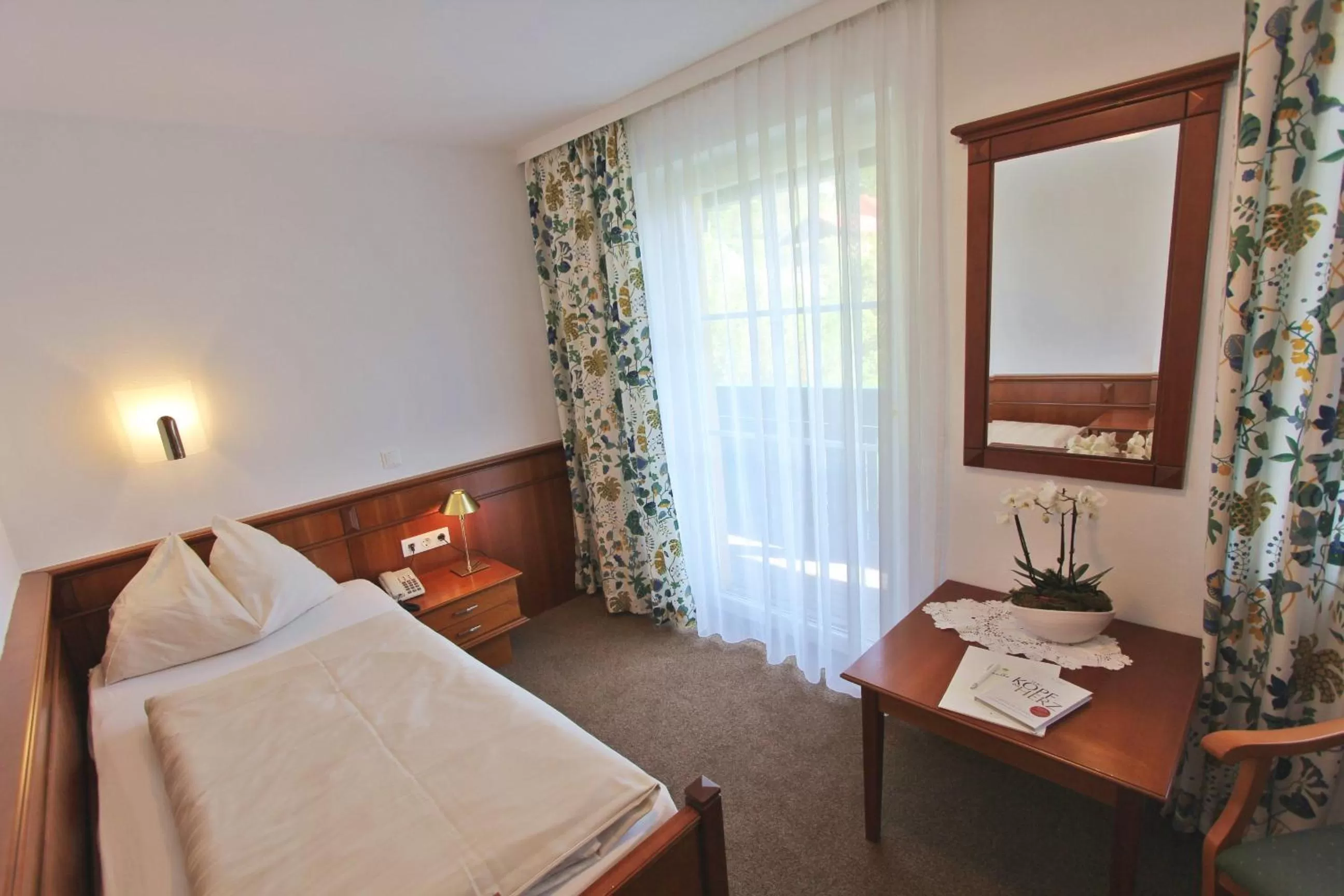 Photo of the whole room, Bed in Landhotel Post Ebensee am Traunsee ***S