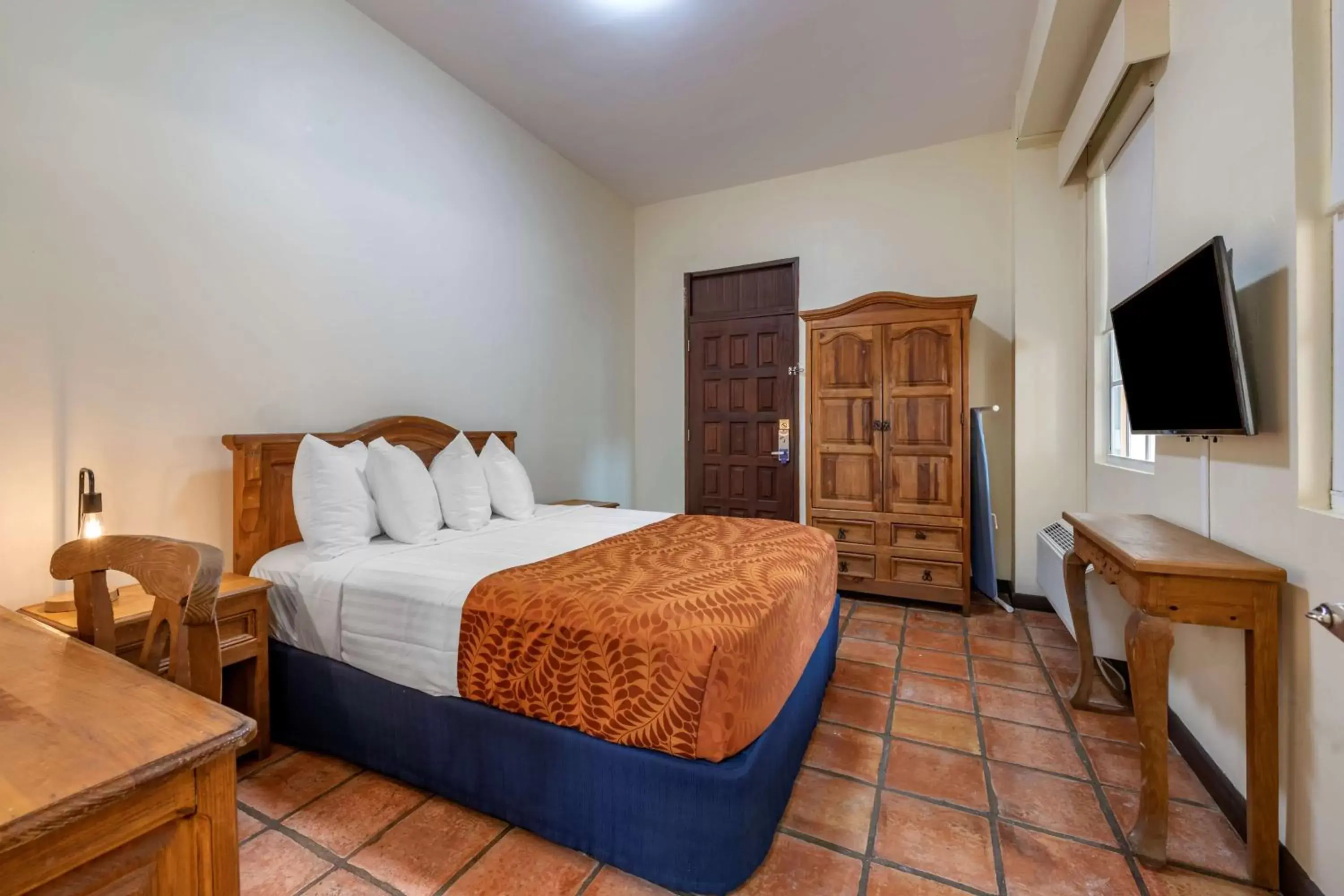 Bedroom, Bed in Mayaguez Plaza Hotel; SureStay Collection by Best Western