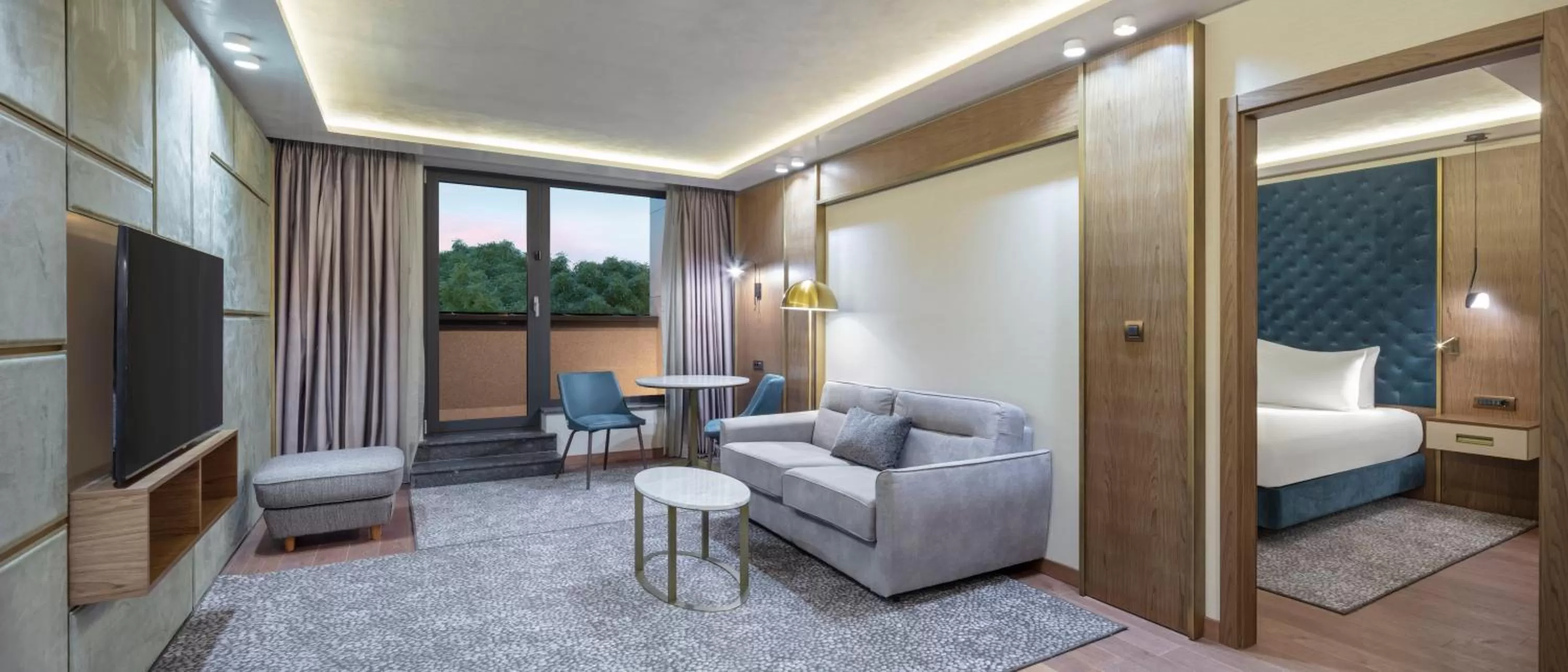 Communal lounge/ TV room, Bed in Doubletree By Hilton Plovdiv Center