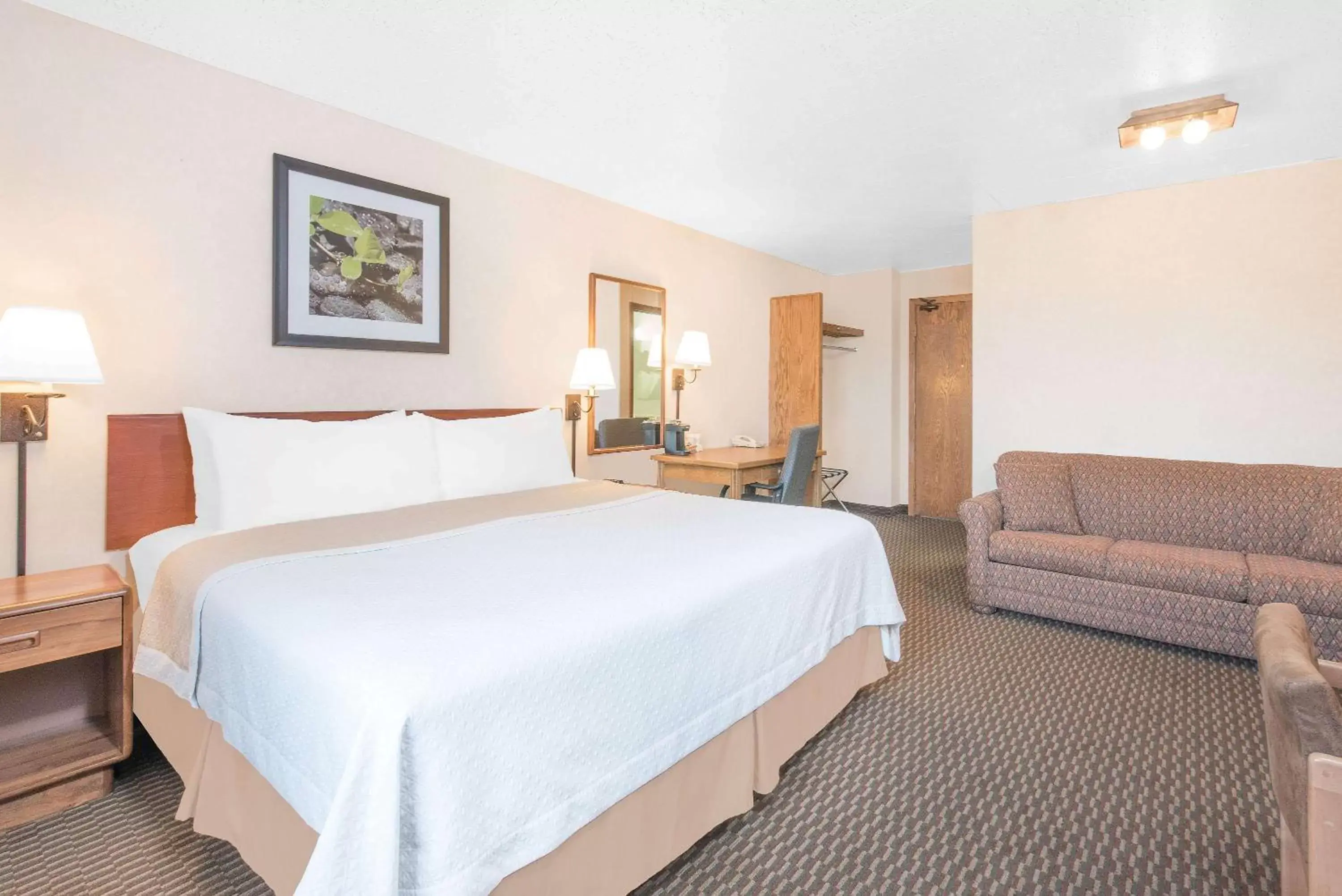 Photo of the whole room, Bed in Days Inn by Wyndham West Rapid City