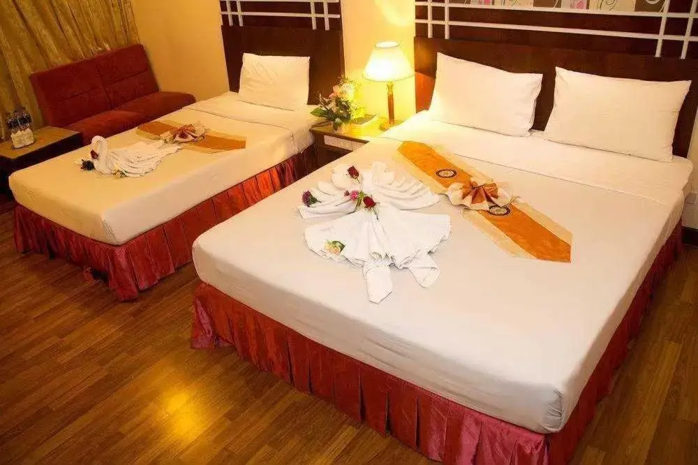 Bed in Friendlytel Hotel