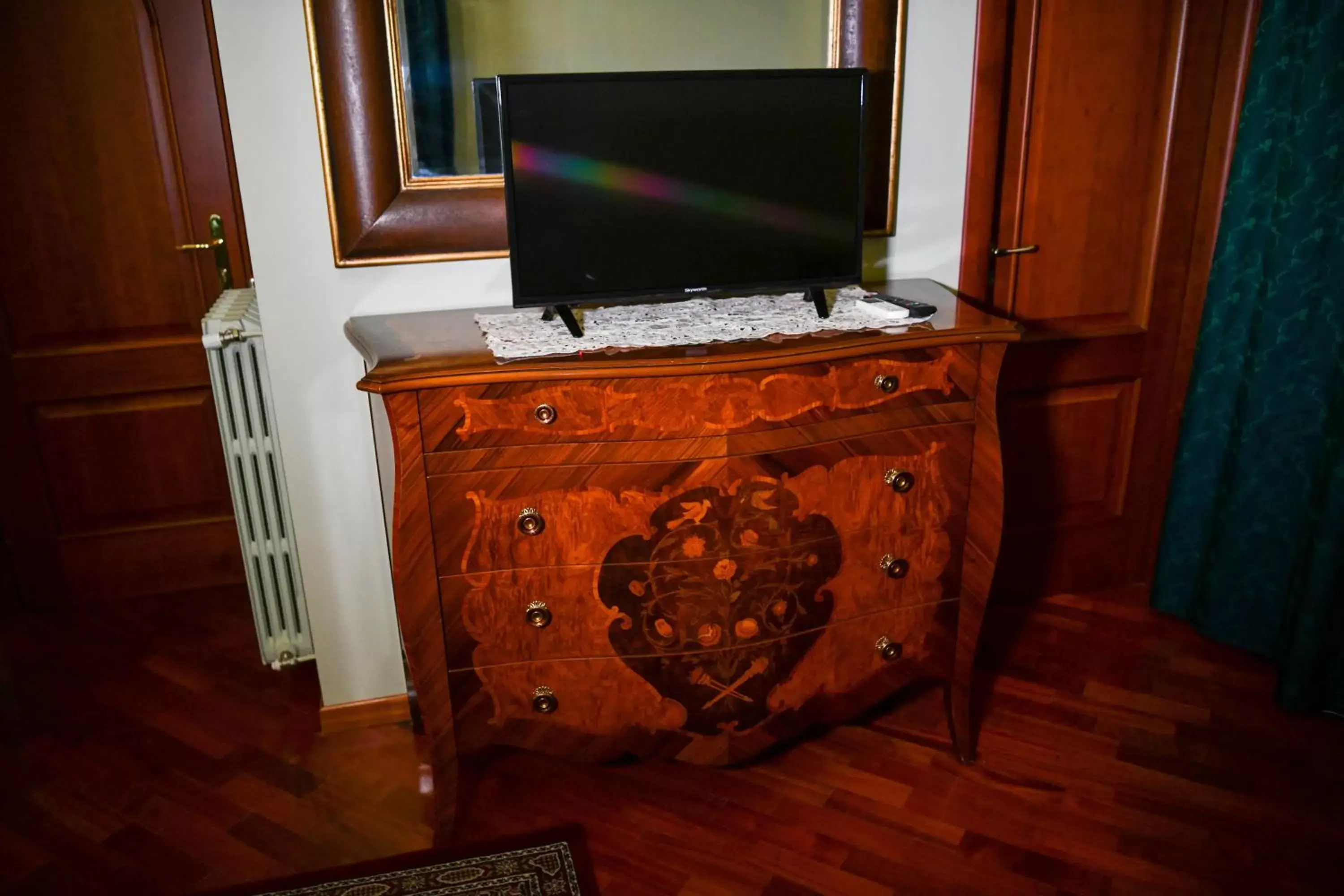 Decorative detail, TV/Entertainment Center in Il Piccolo Hotel