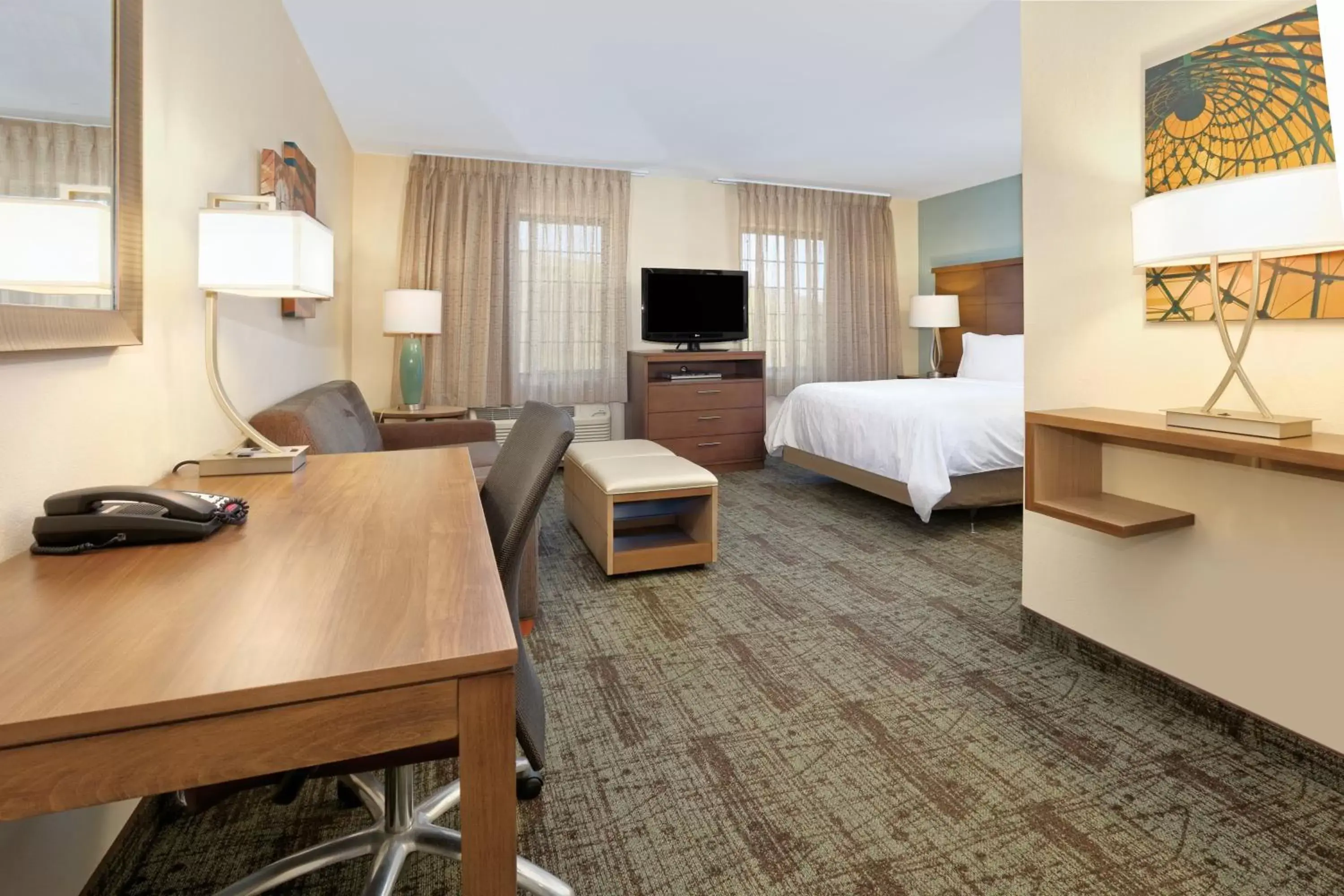 Photo of the whole room, TV/Entertainment Center in Staybridge Suites Corning, an IHG Hotel