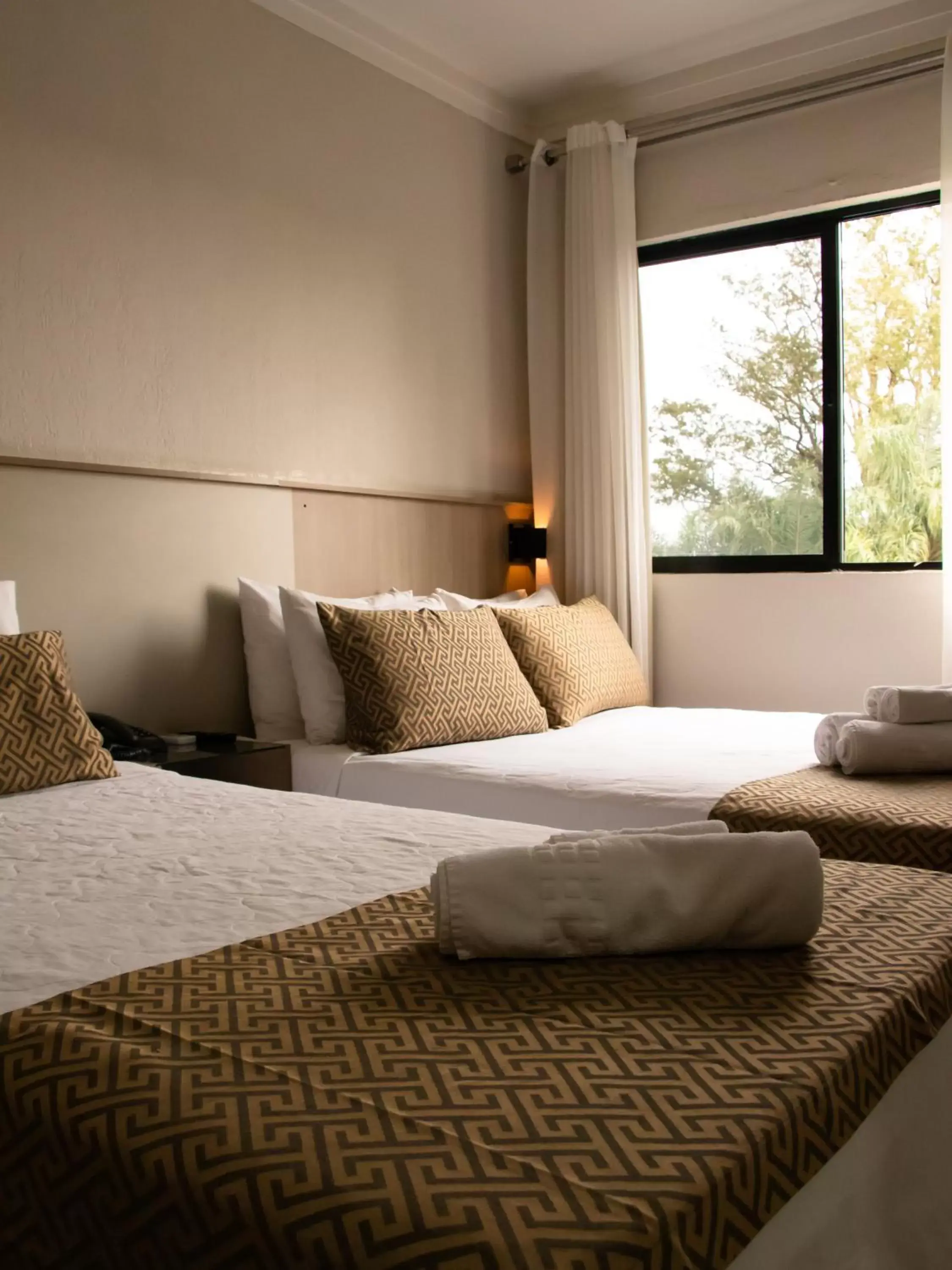 Bed in Iguassu Express Hotel