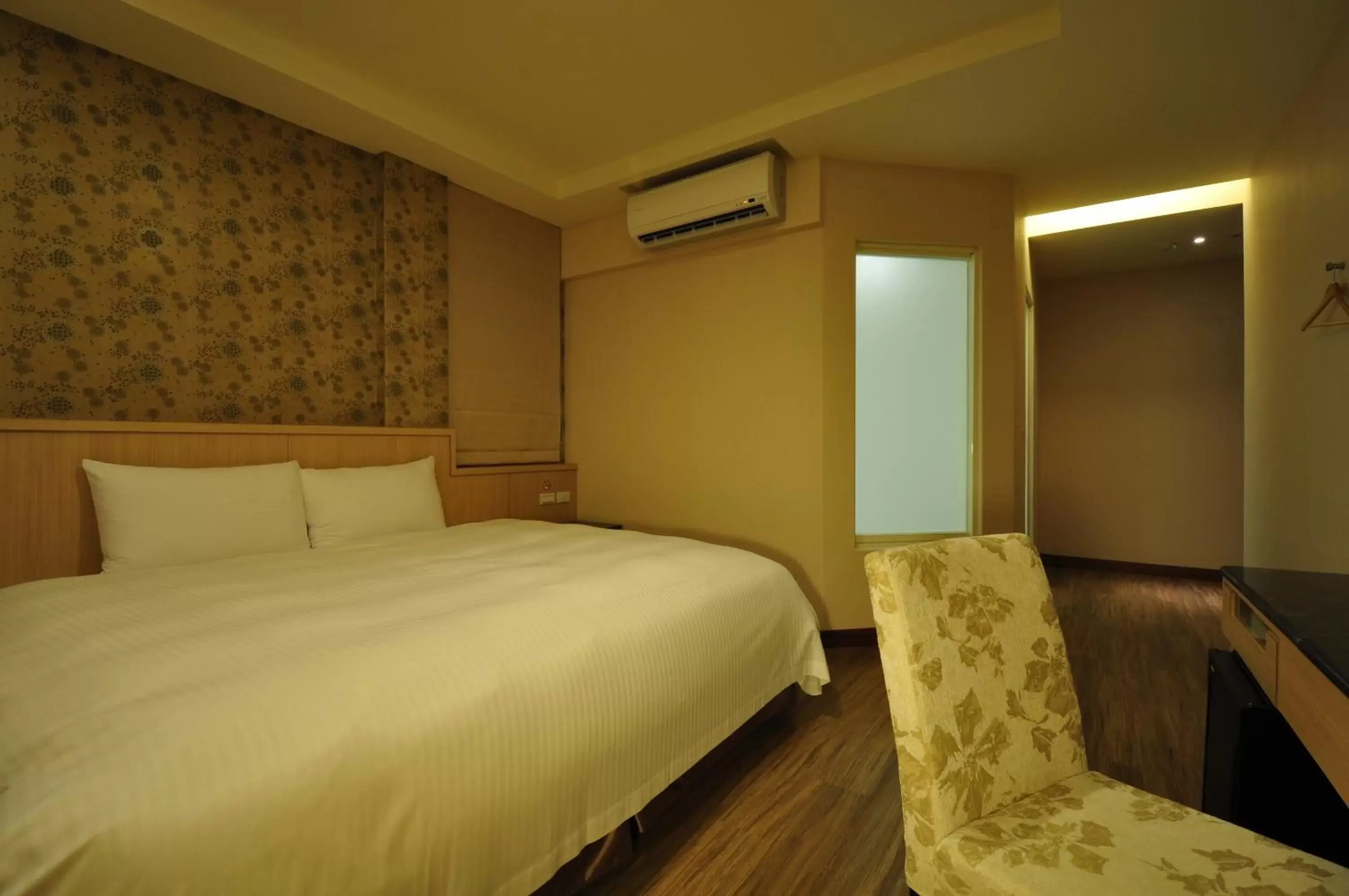 Bed in Fupin Hotel