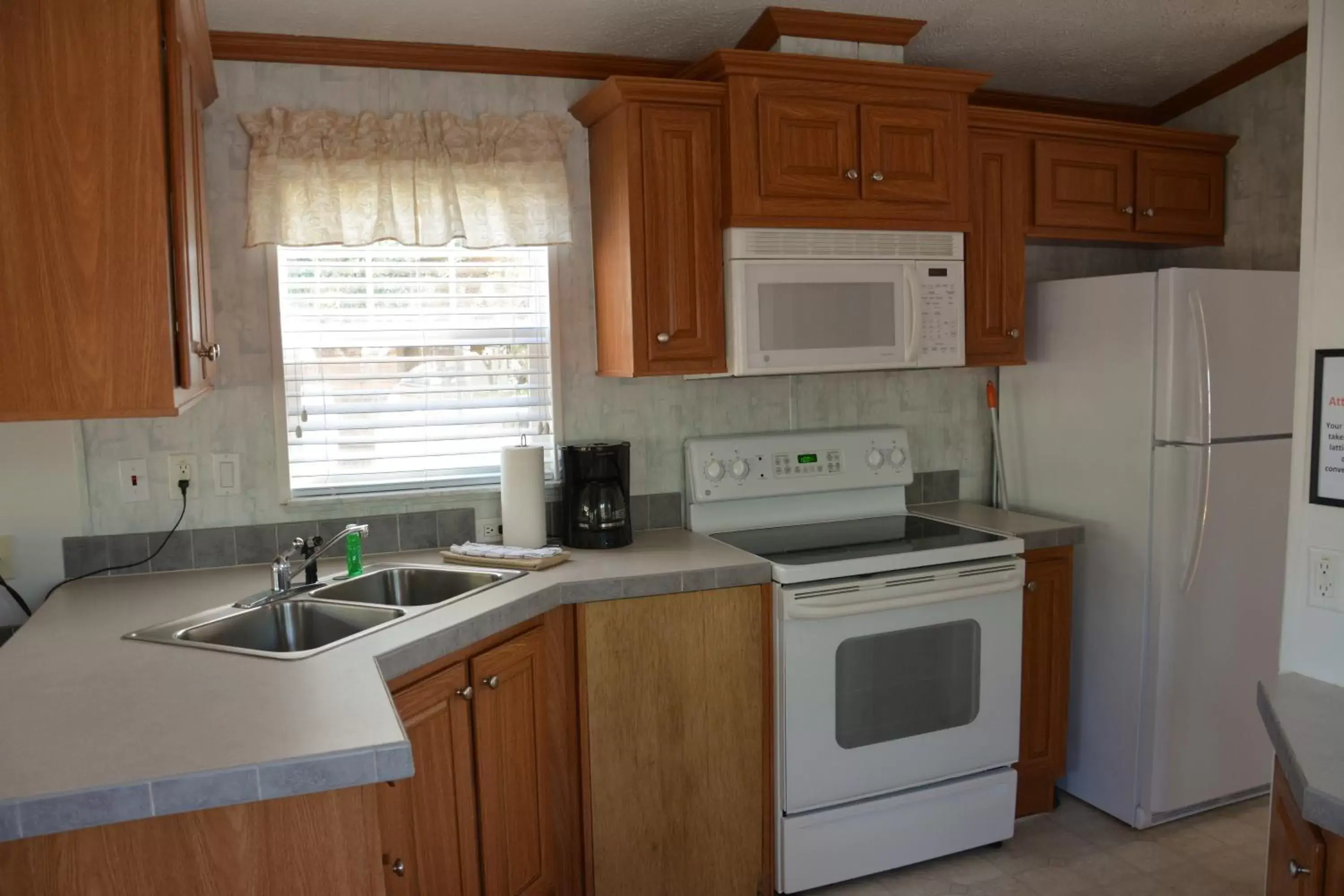 Kitchen/Kitchenette in Camp Mack, A Guy Harvey Lodge