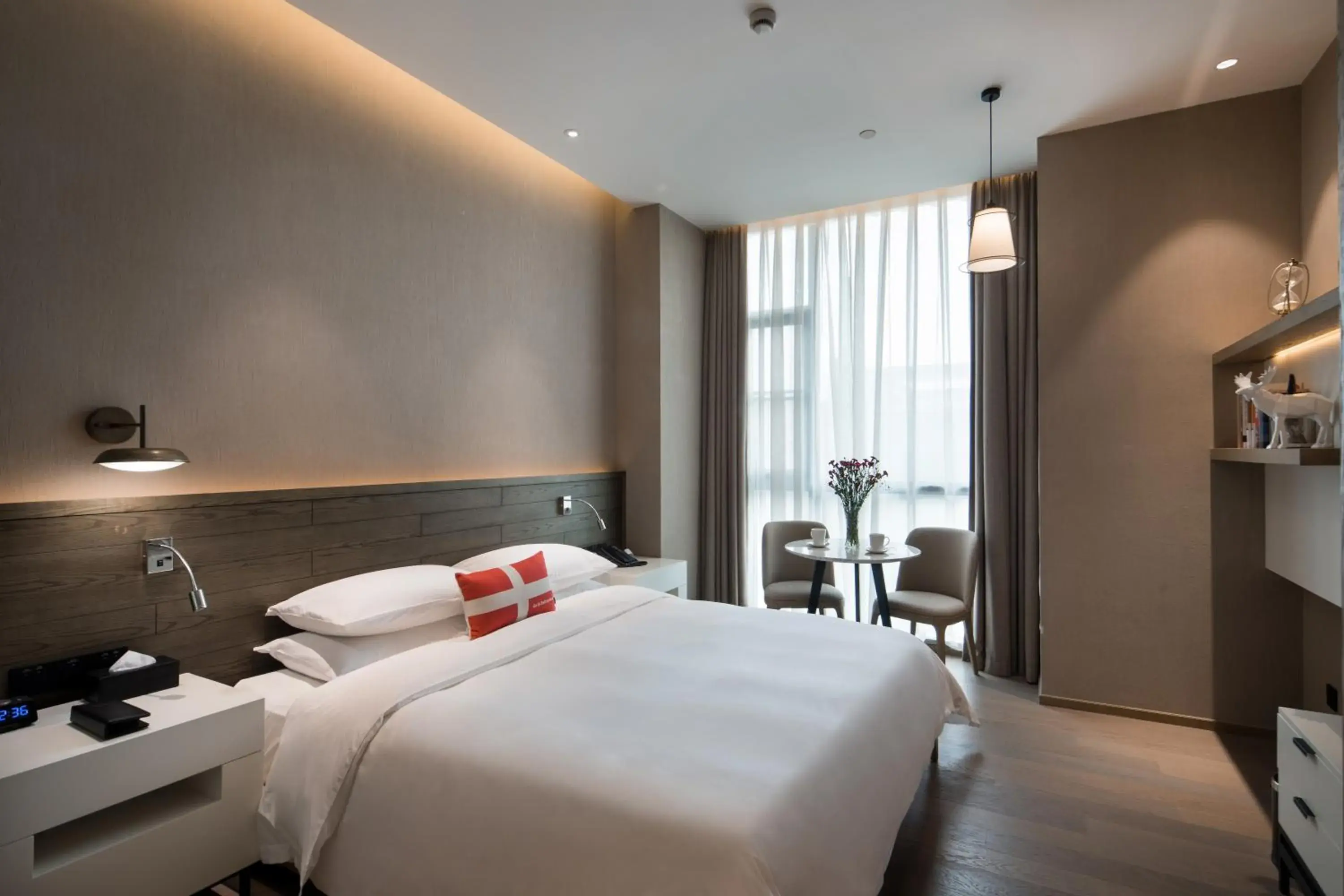 Photo of the whole room, Bed in Swisstouches Guangzhou Hotel Residences