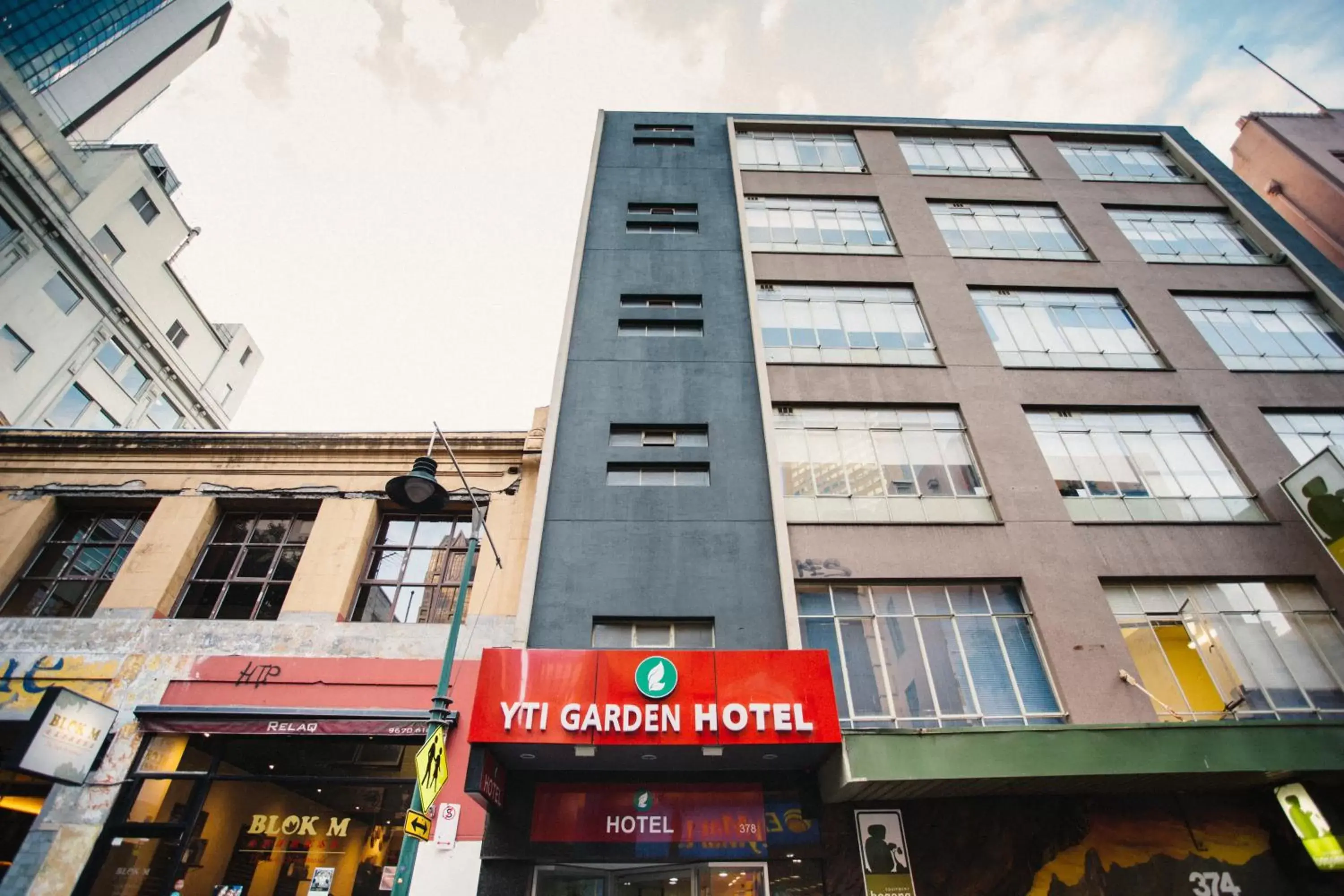 Facade/entrance in YTI Garden Hotel