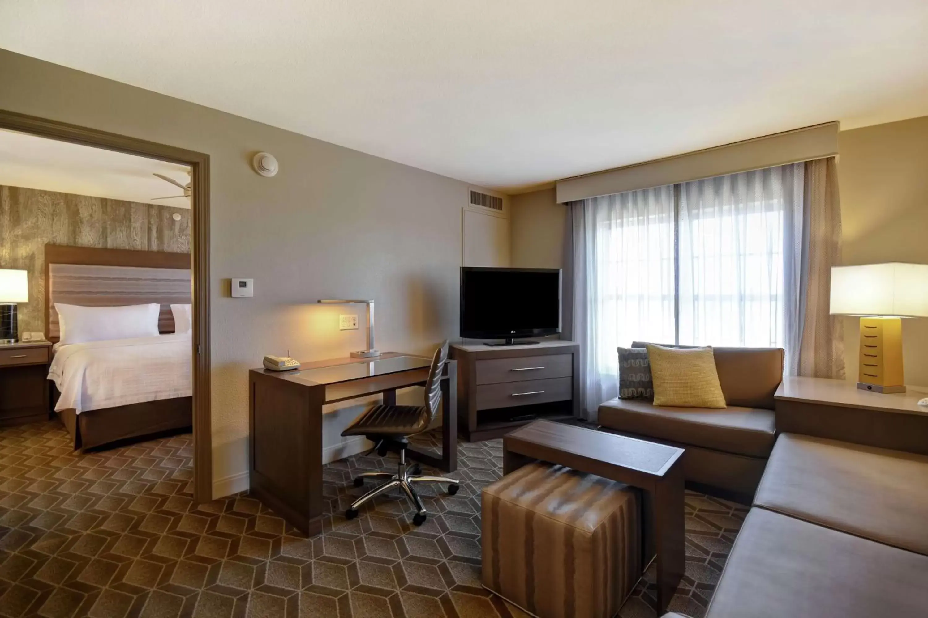 Bedroom, TV/Entertainment Center in Homewood Suites by Hilton at The Waterfront