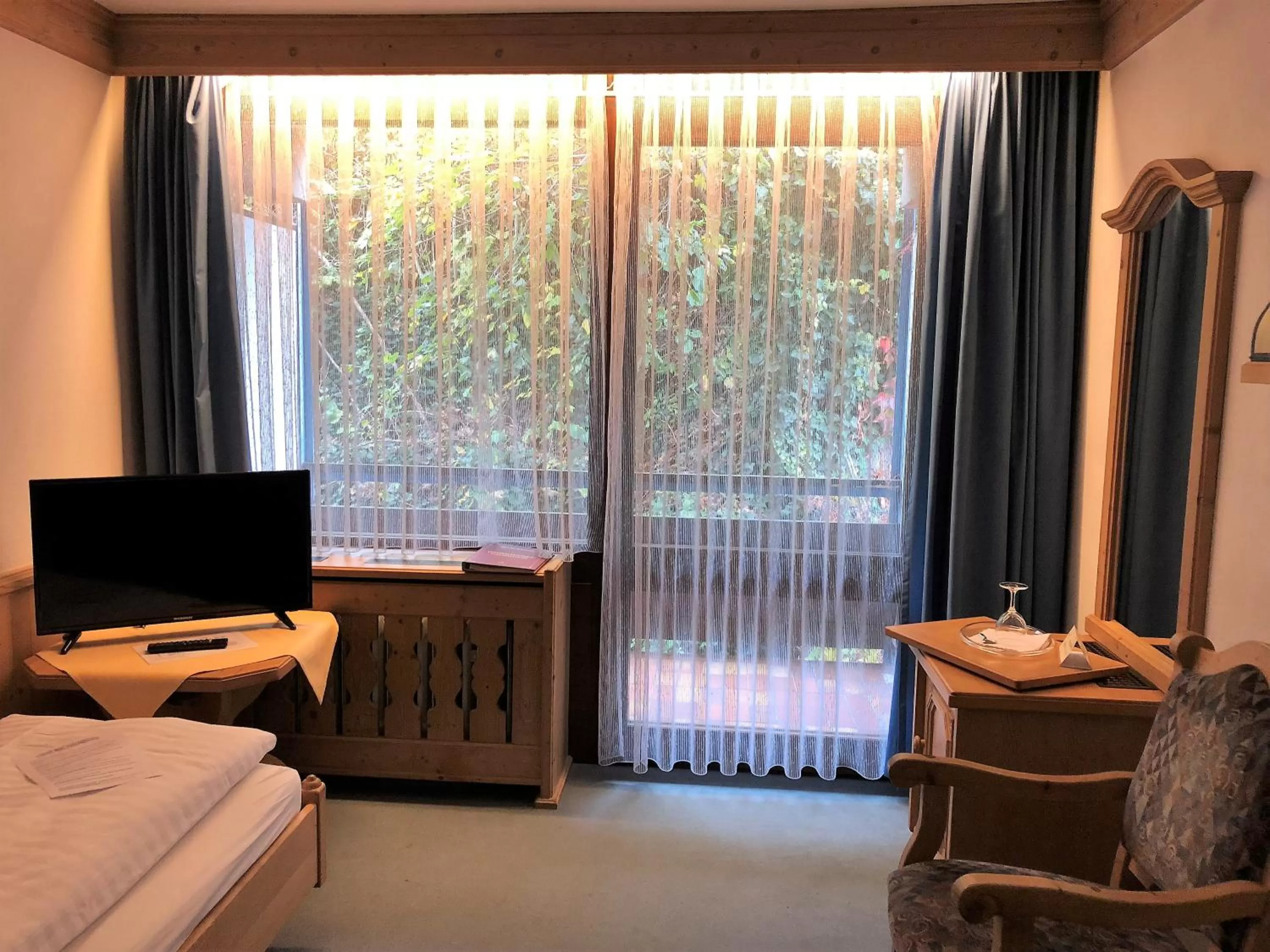 Bed in Hotel Vier Jahreszeiten