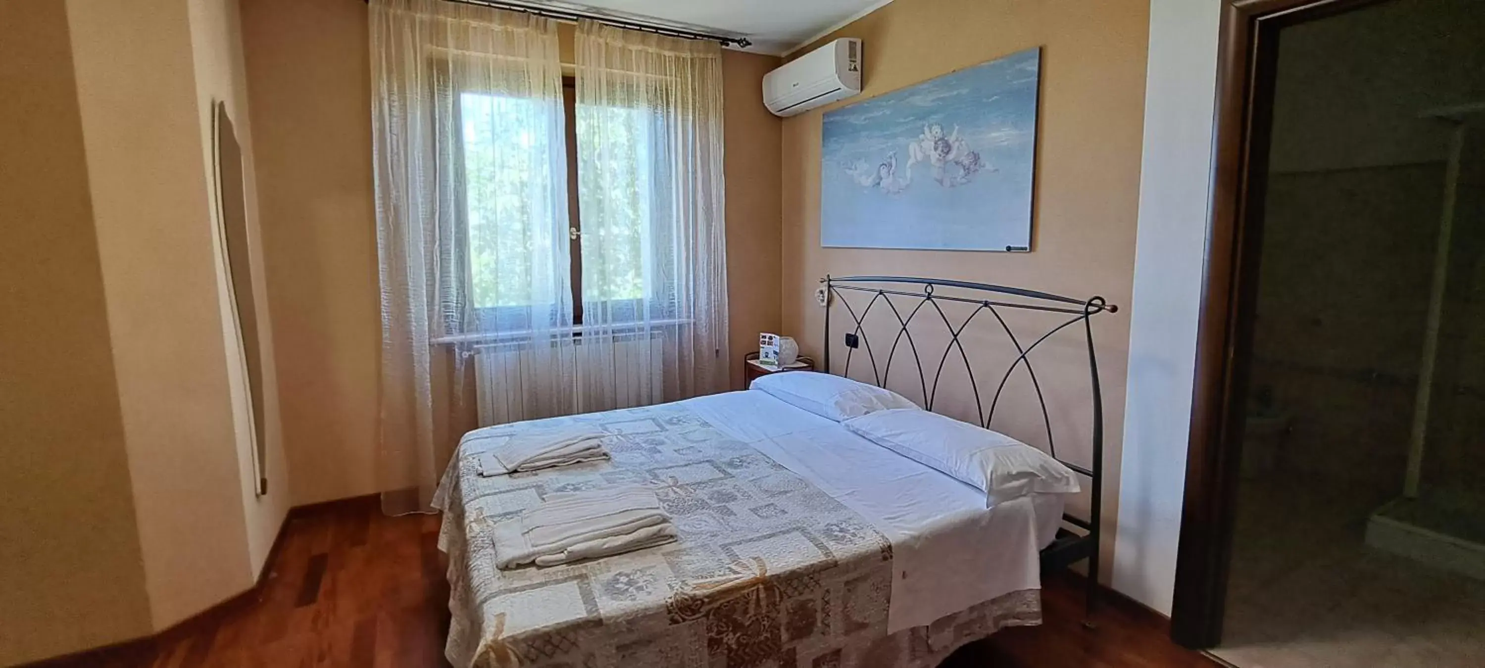 Bed in B & B le tre rose