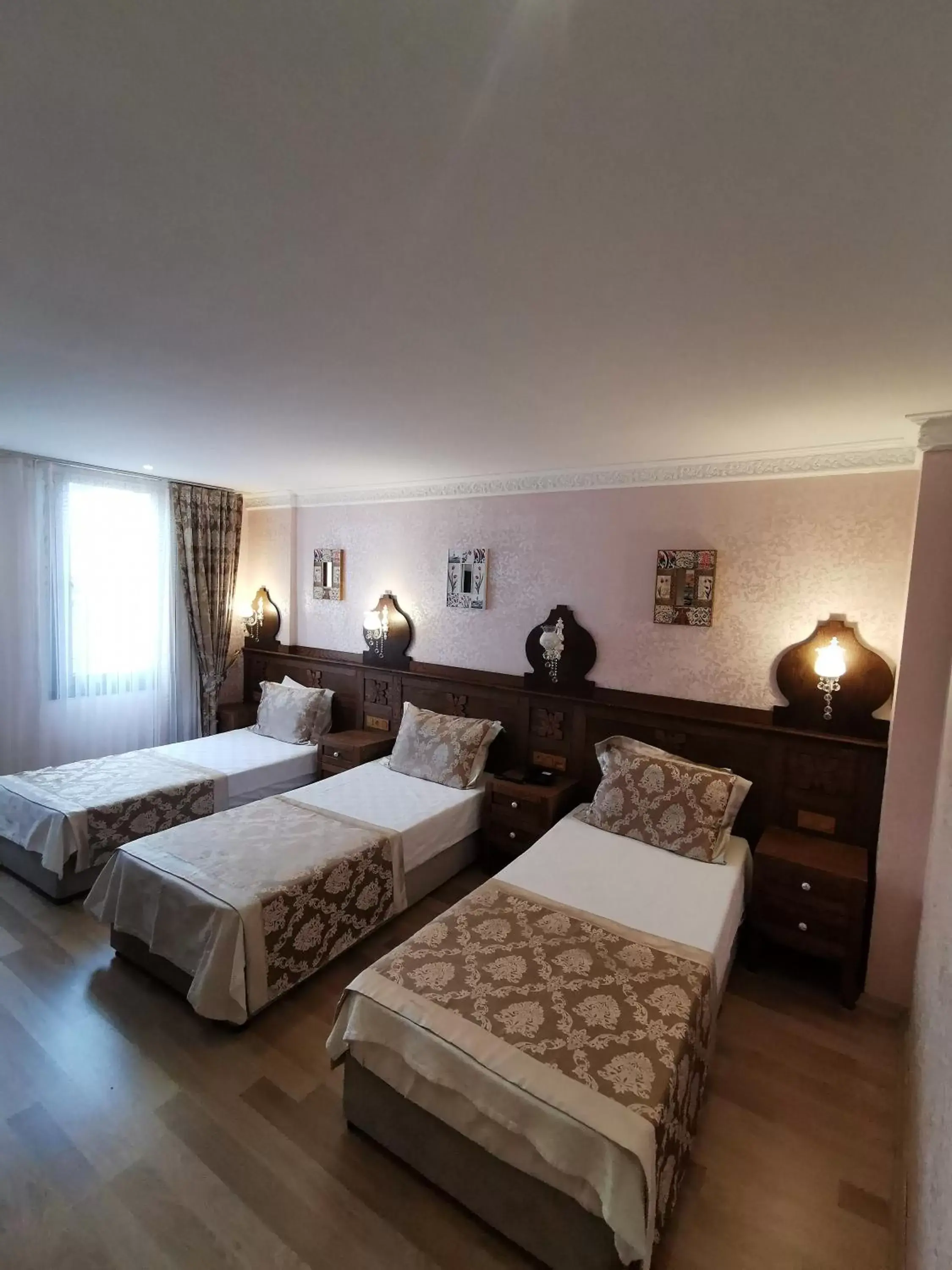 Bed in Perapolis Hotel