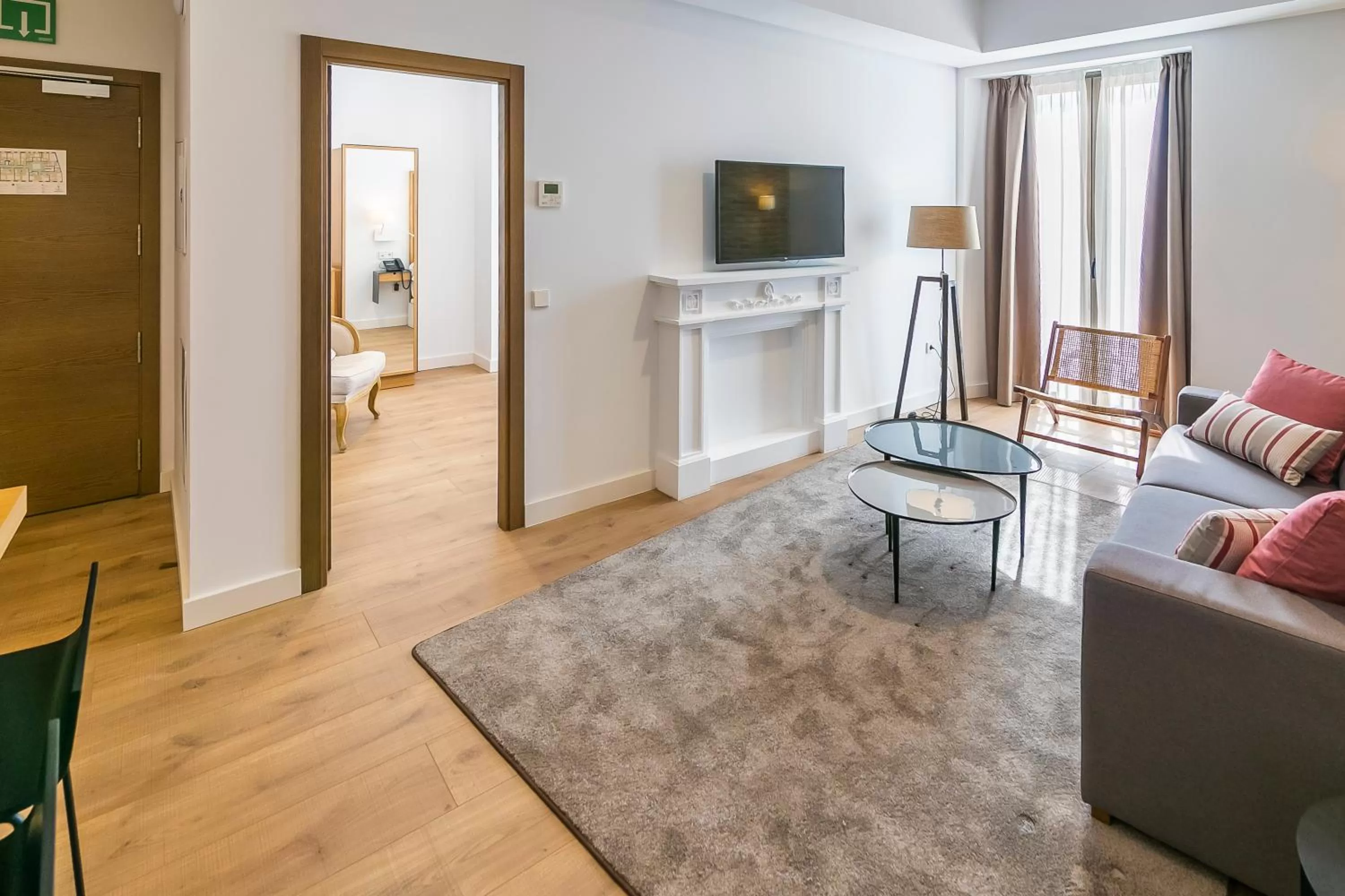 Communal lounge/ TV room in Aquitania Home Suites