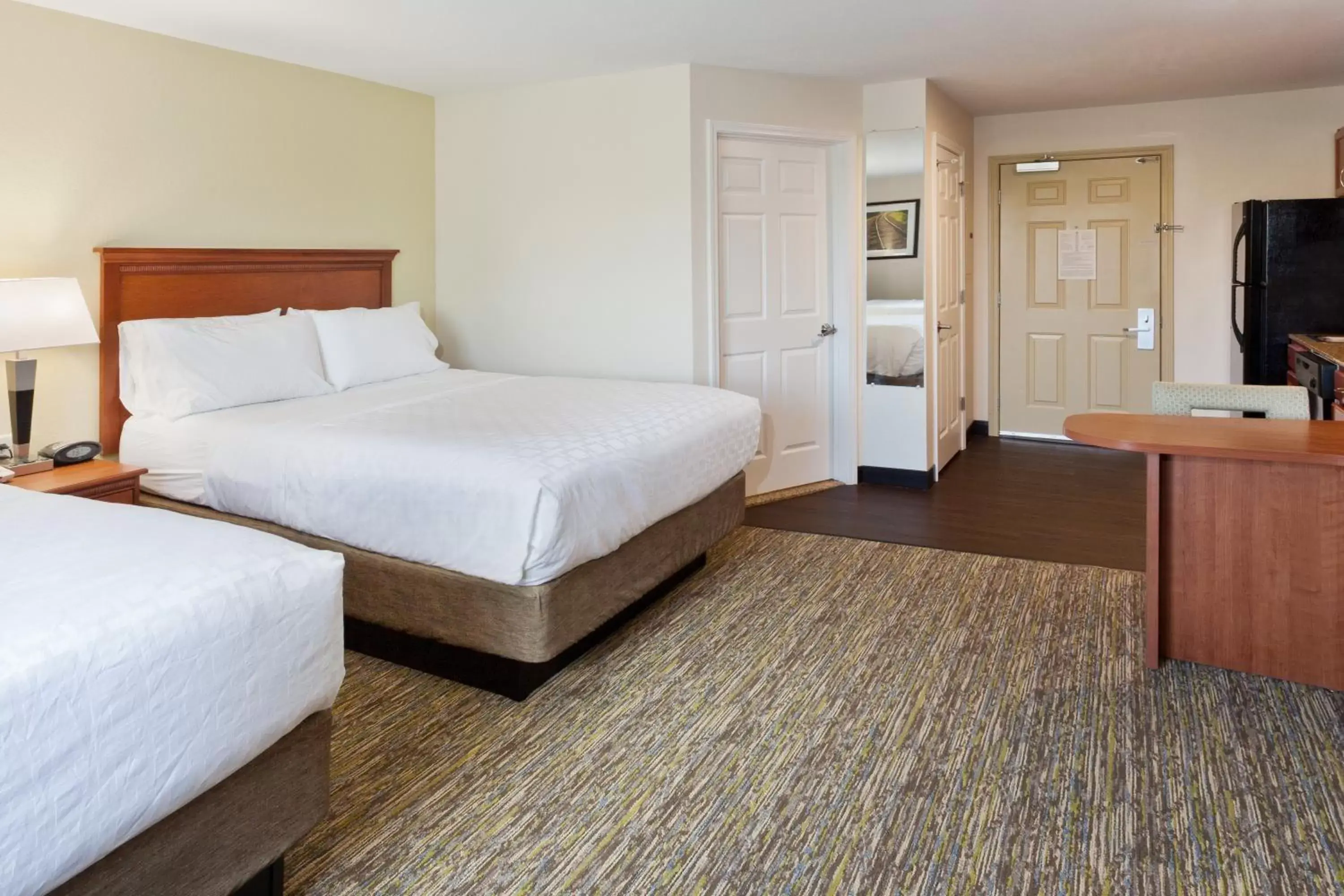 Photo of the whole room, Bed in Candlewood Suites Eastchase Park, an IHG Hotel