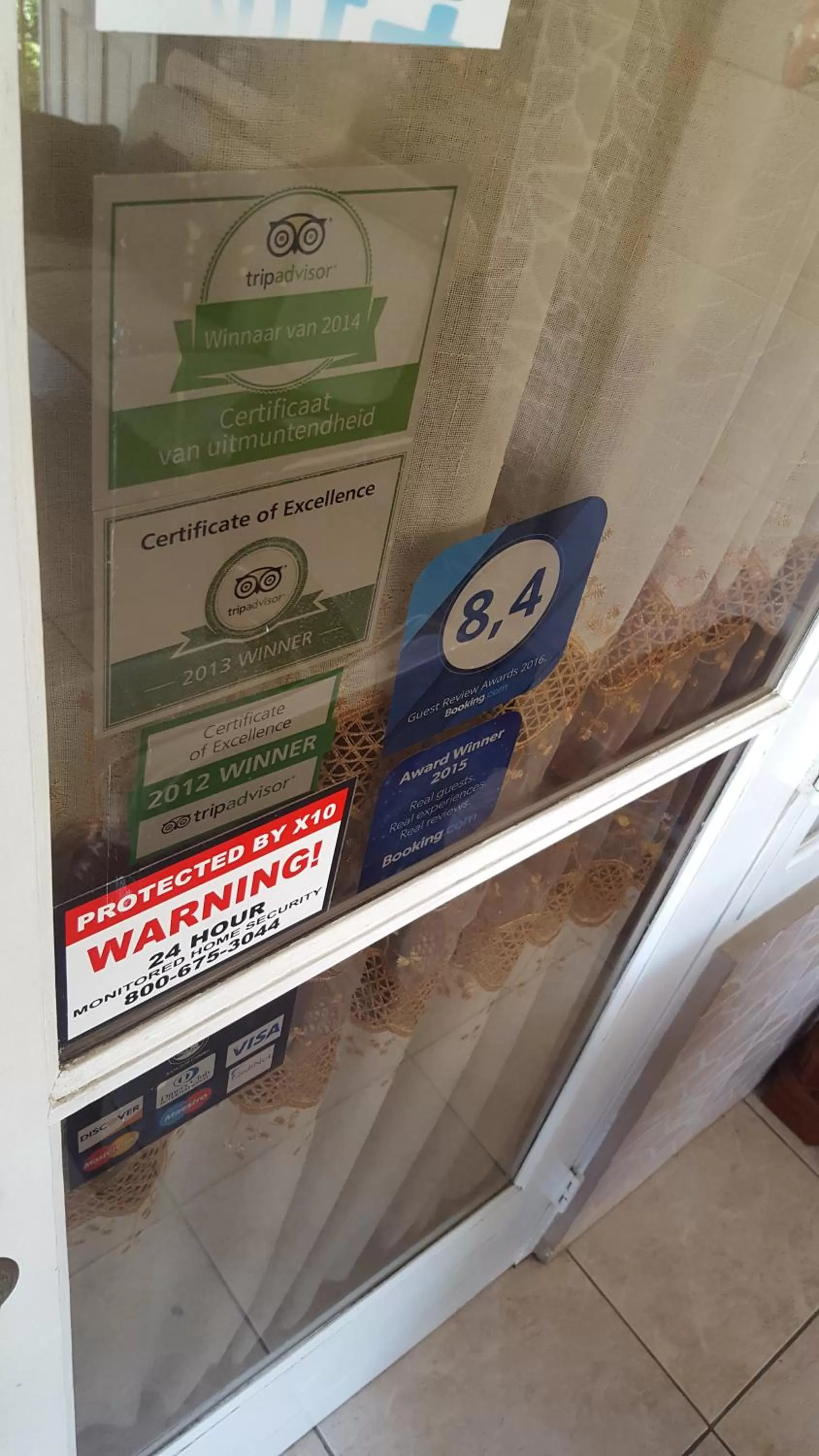 Logo/Certificate/Sign in A1 Apartments Aruba