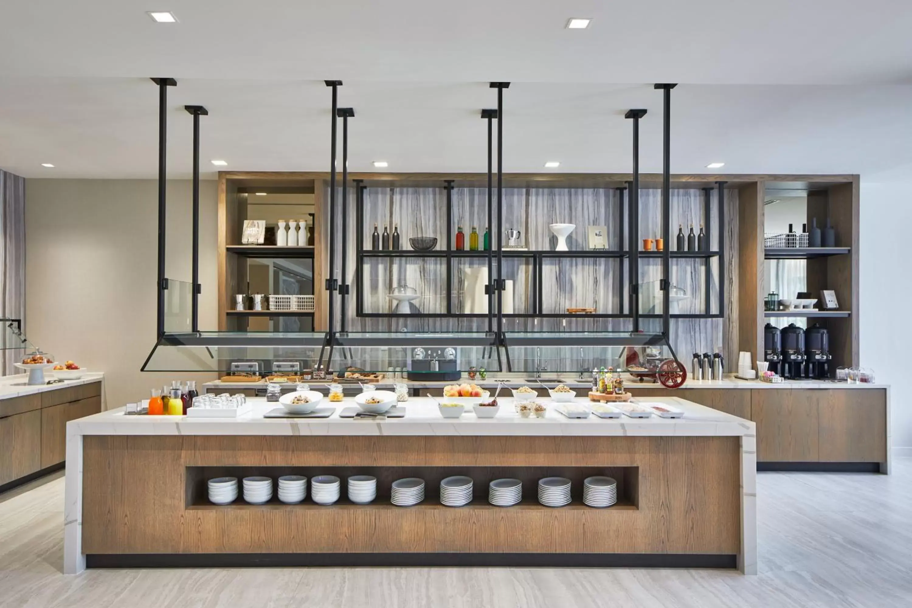 Kitchen or kitchenette in AC Hotel by Marriott Orlando Lake Buena Vista