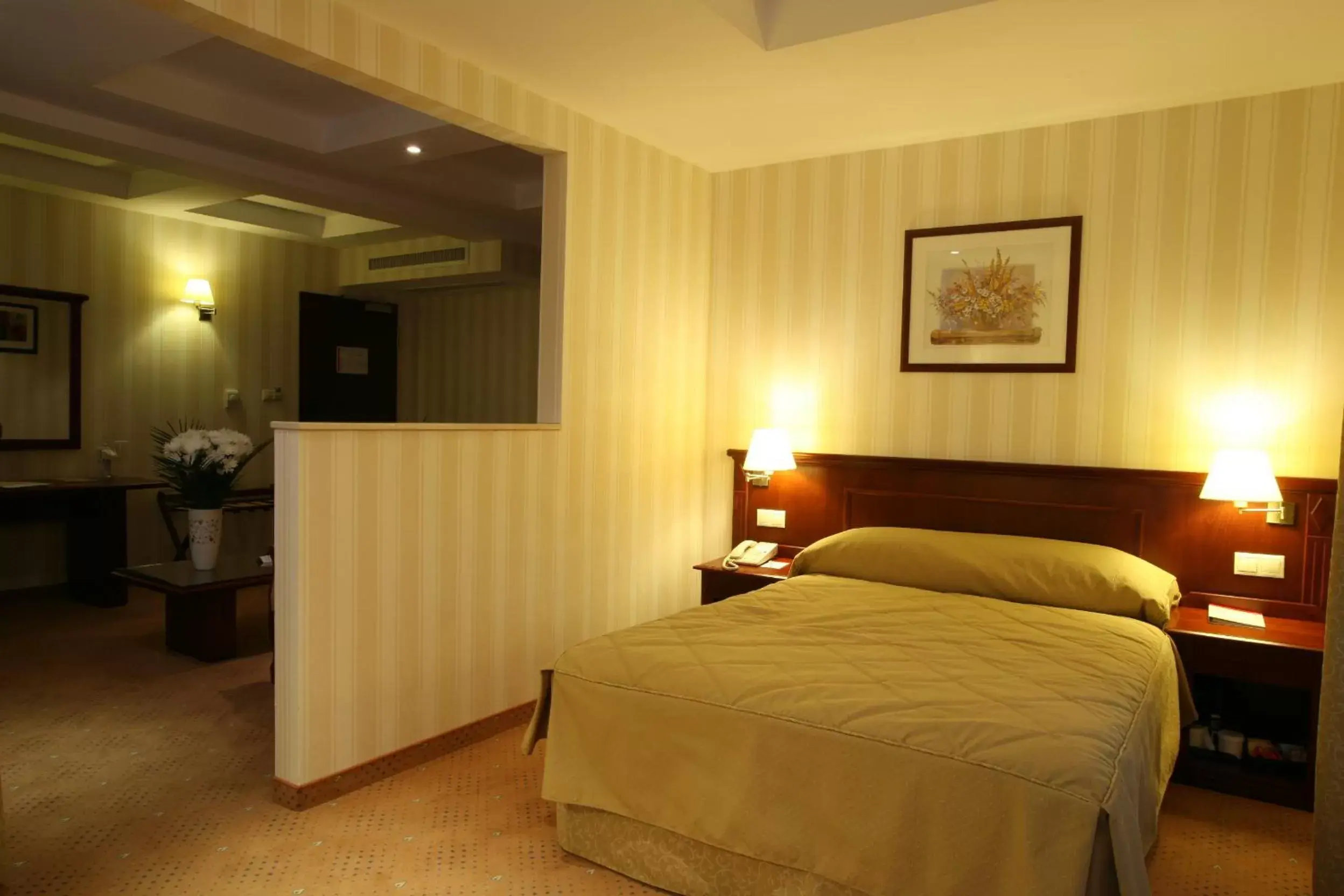 Photo of the whole room, Bed in Ramada Hotel & Suites by Wyndham Bucharest North
