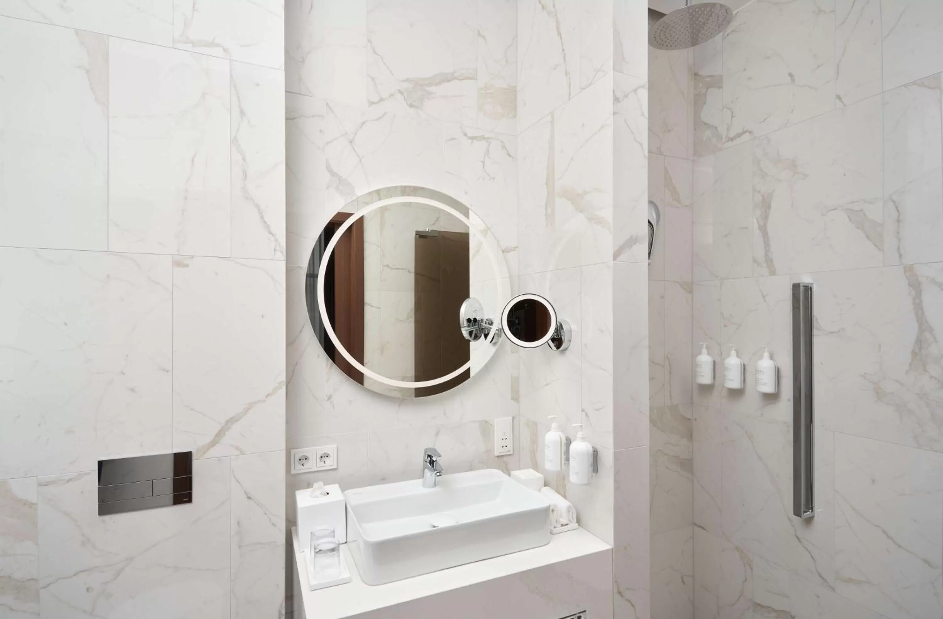 Bathroom in Iceland Parliament Hotel, Curio Collection By Hilton