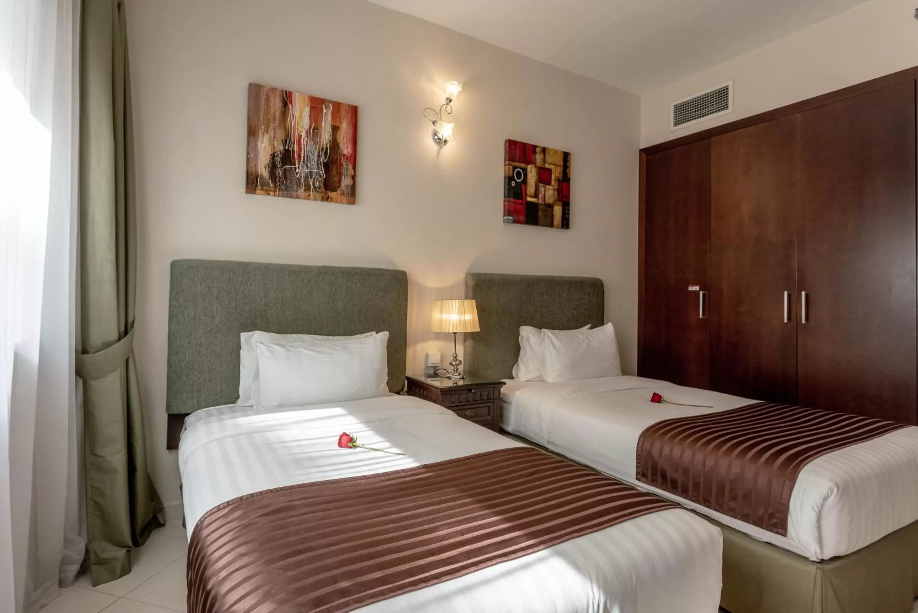 Bed in Auris Boutique Hotel Apartments - AlBarsha