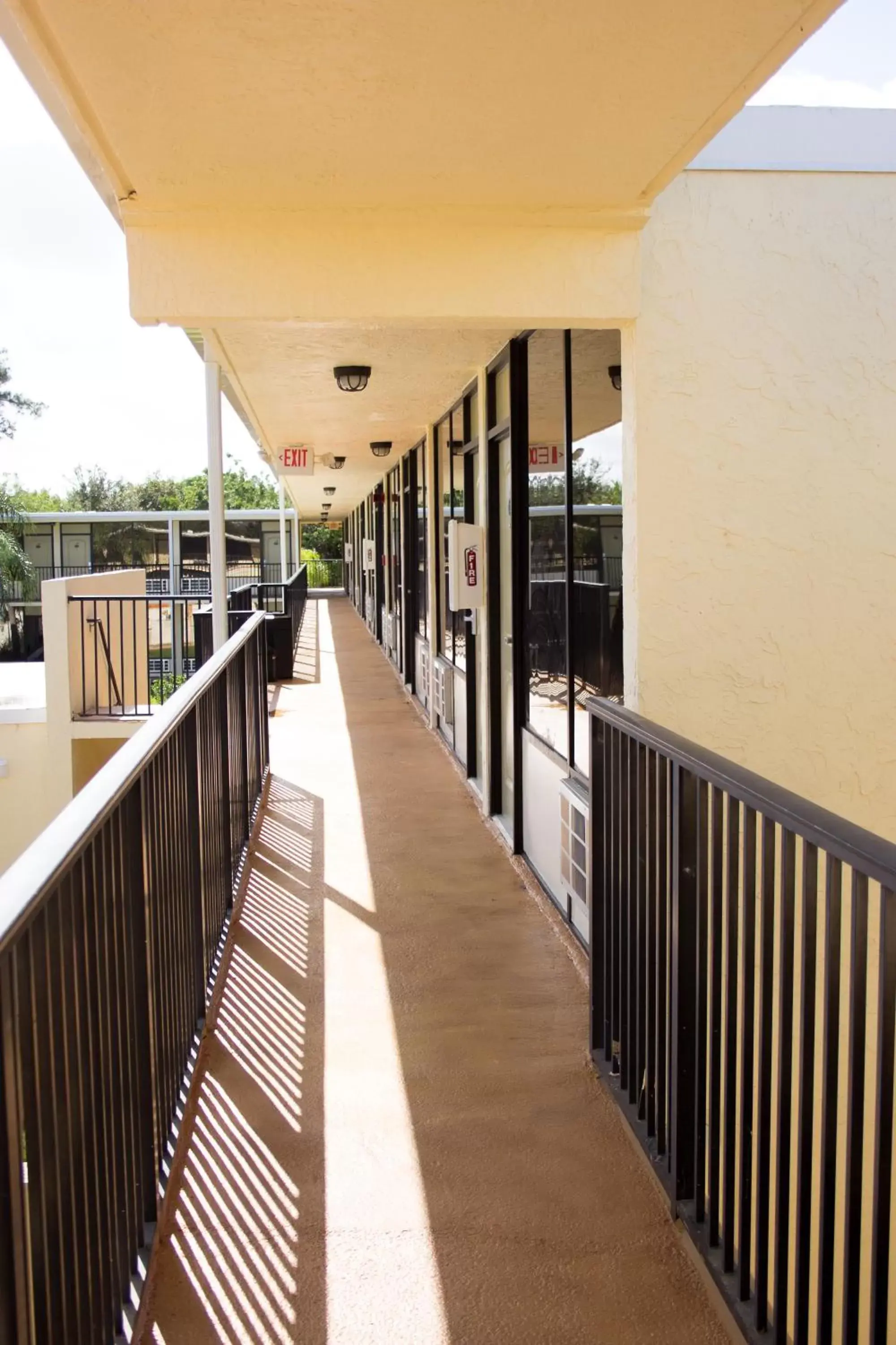 Facade/entrance, Balcony/Terrace in At Home Inn - Fort Pierce