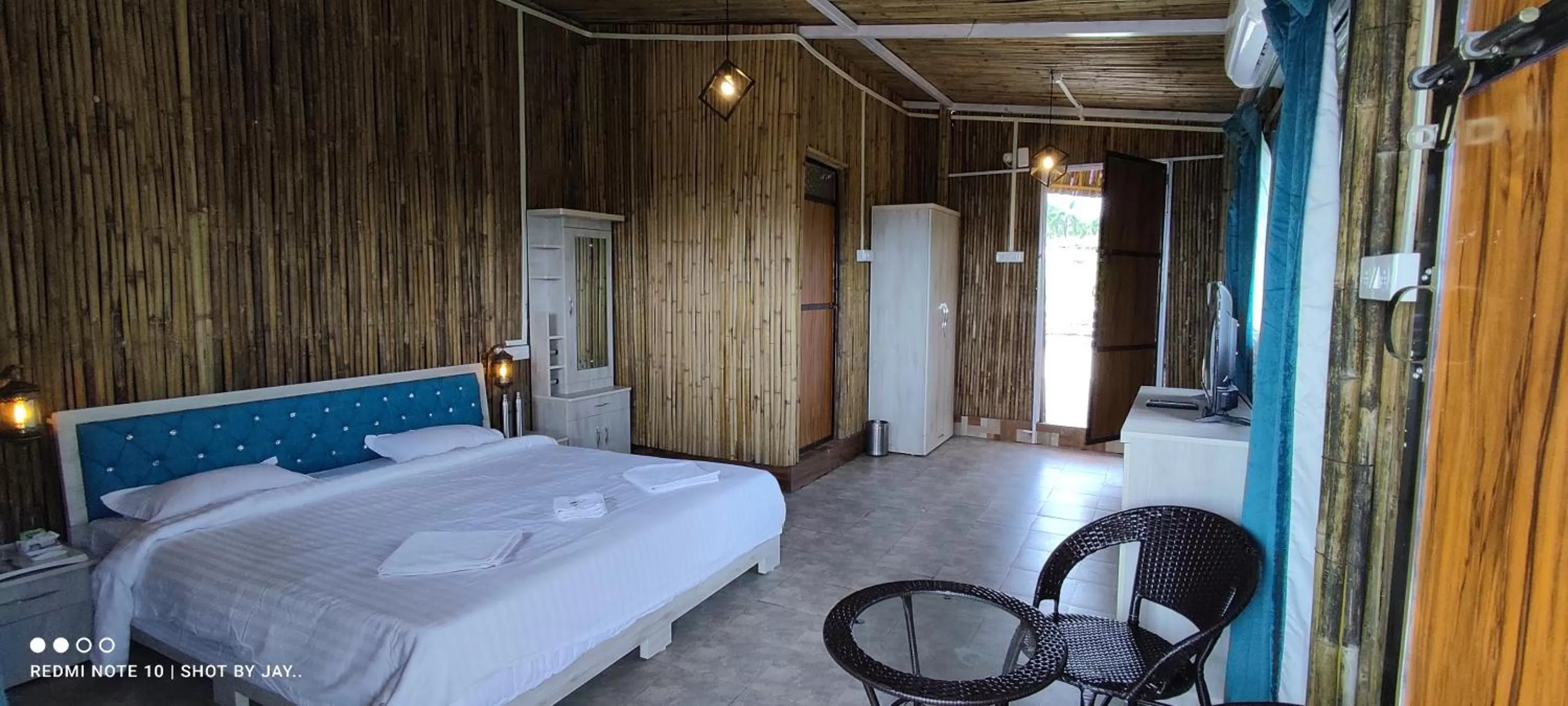 Photo of the whole room, Bed in Mango Valley Resort Ganpatipule