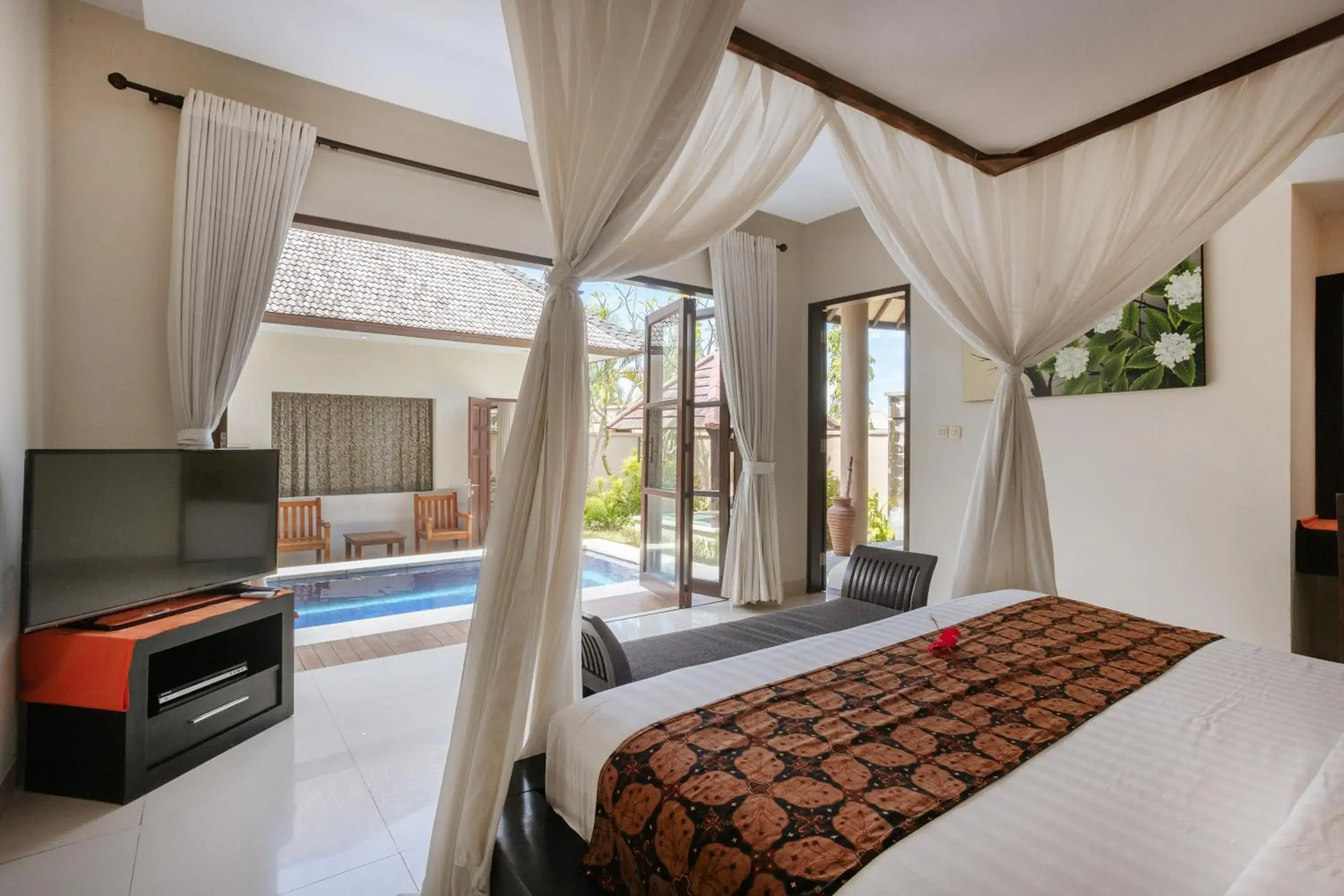 Bed in The Bidadari Villas and Spa