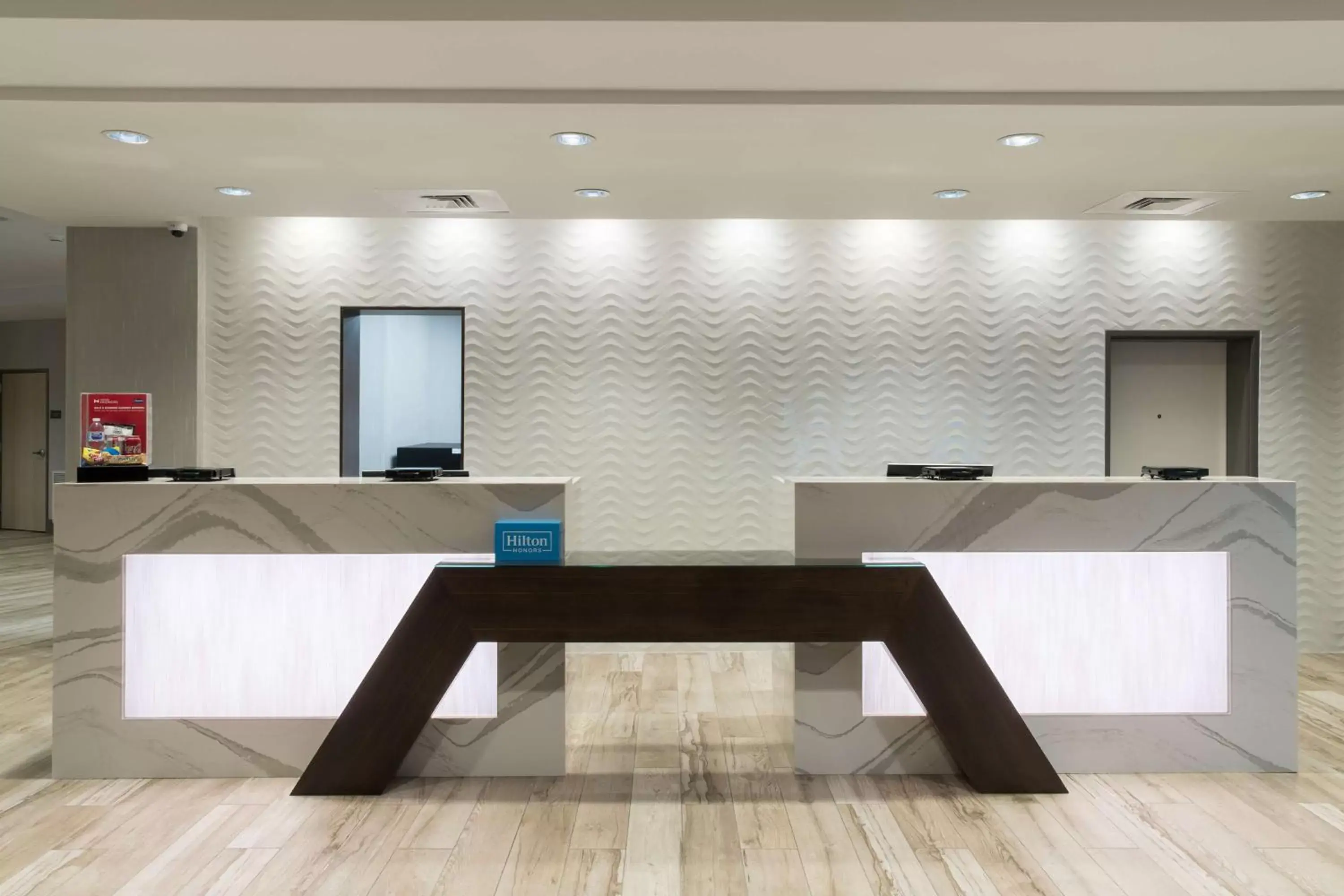 Lobby or reception in Hampton Inn & Suites Cape Canaveral Cruise Port, Fl Lobby or reception in Hampton Inn & Suites Cape Canaveral Cruise Port, Fl