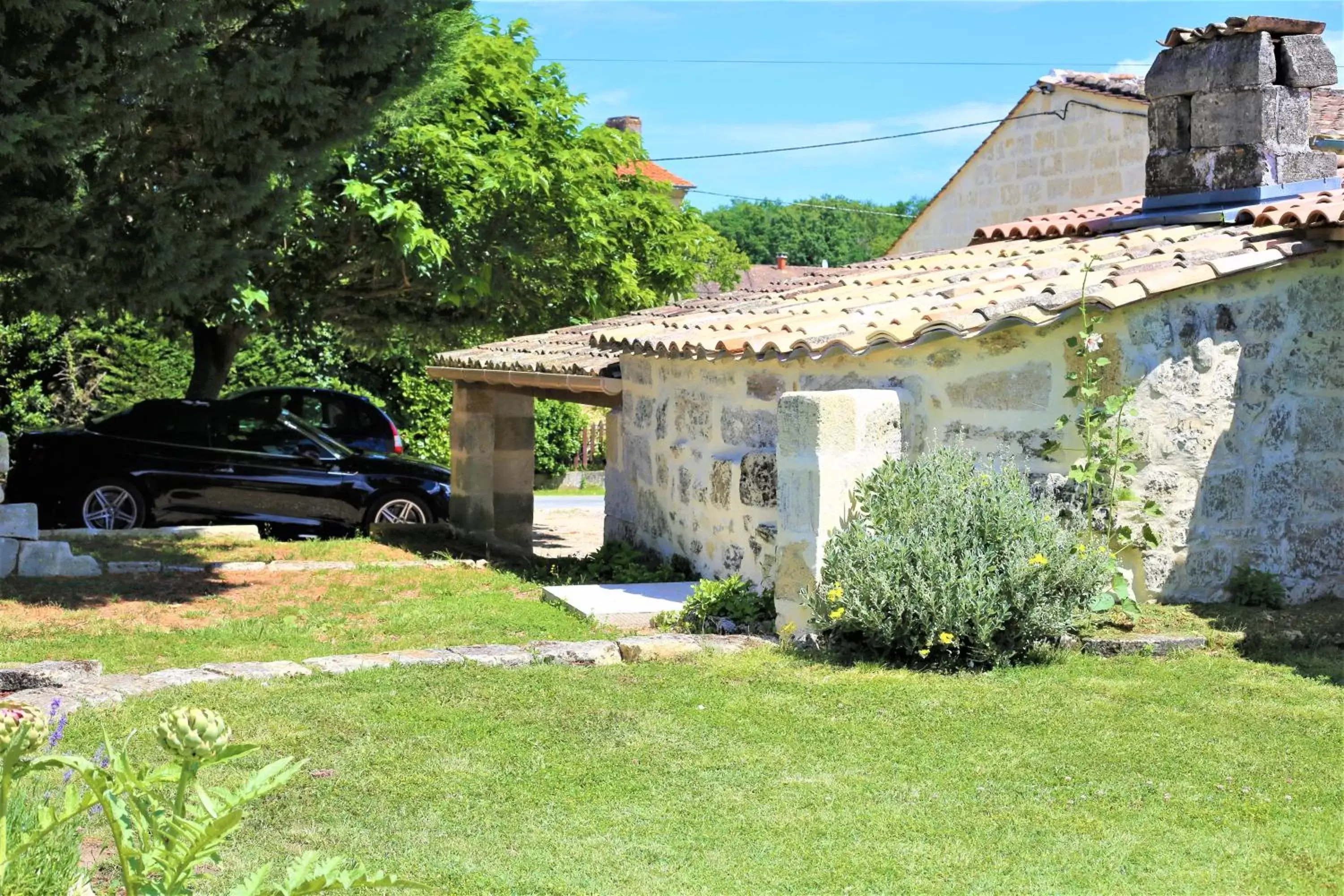 Garden, Property Building in Au Do'Mayne des Bouilles - Spa & Piscine