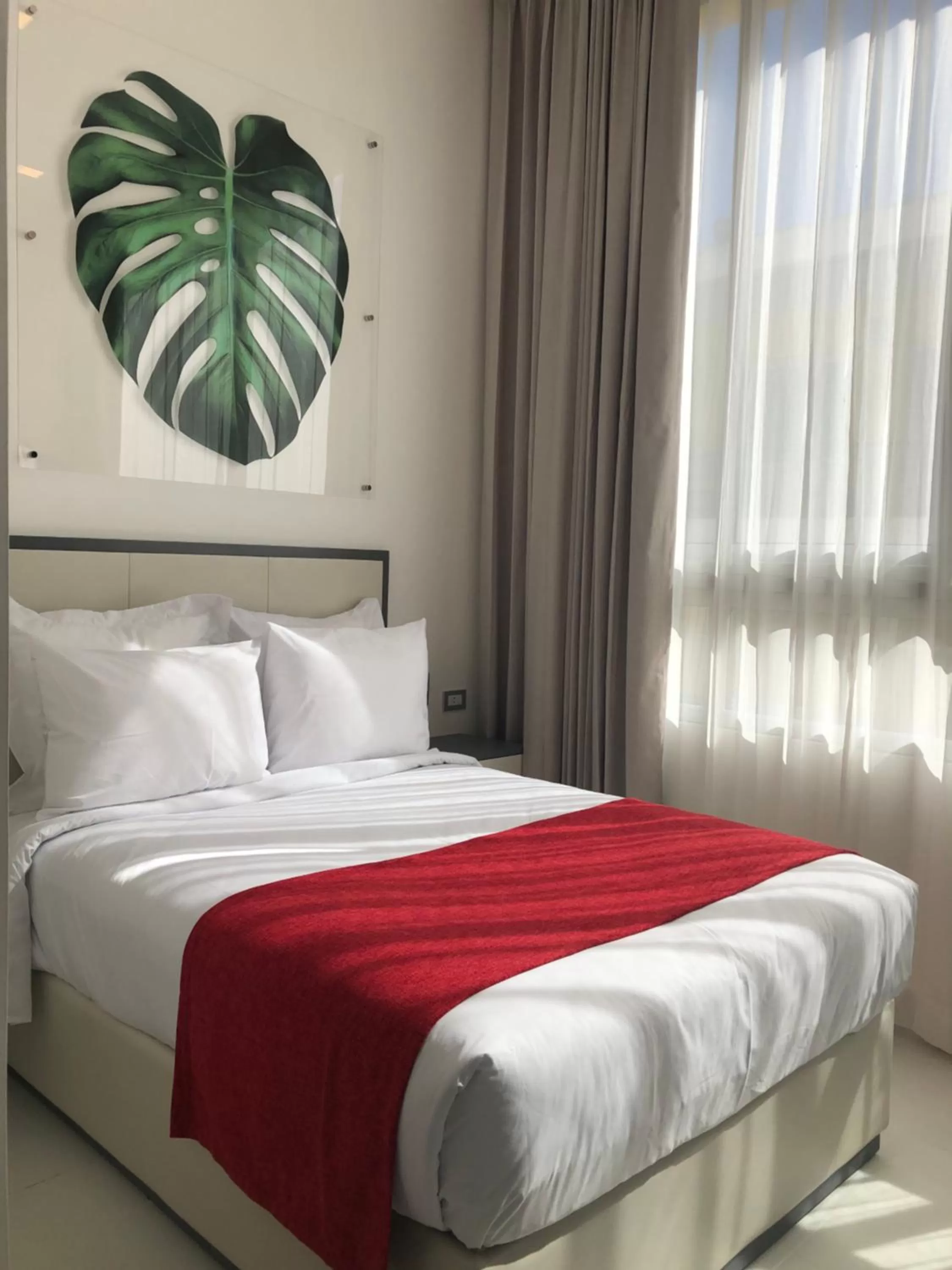 Bed in Gran Hotel Europa Santo Domingo Trademark Collection by Wyndham