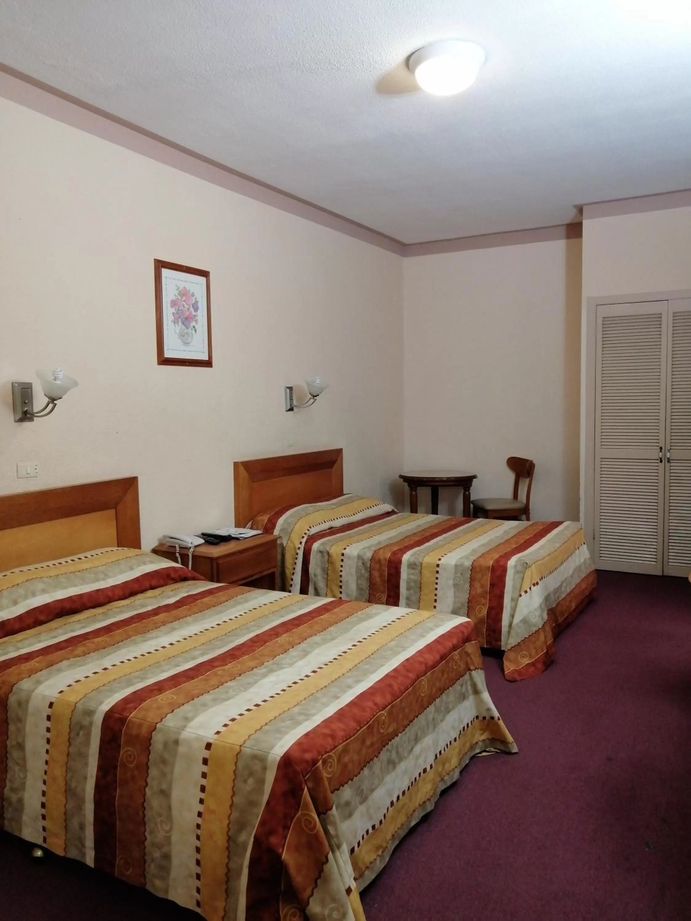 Bed in Hotel Astromundo